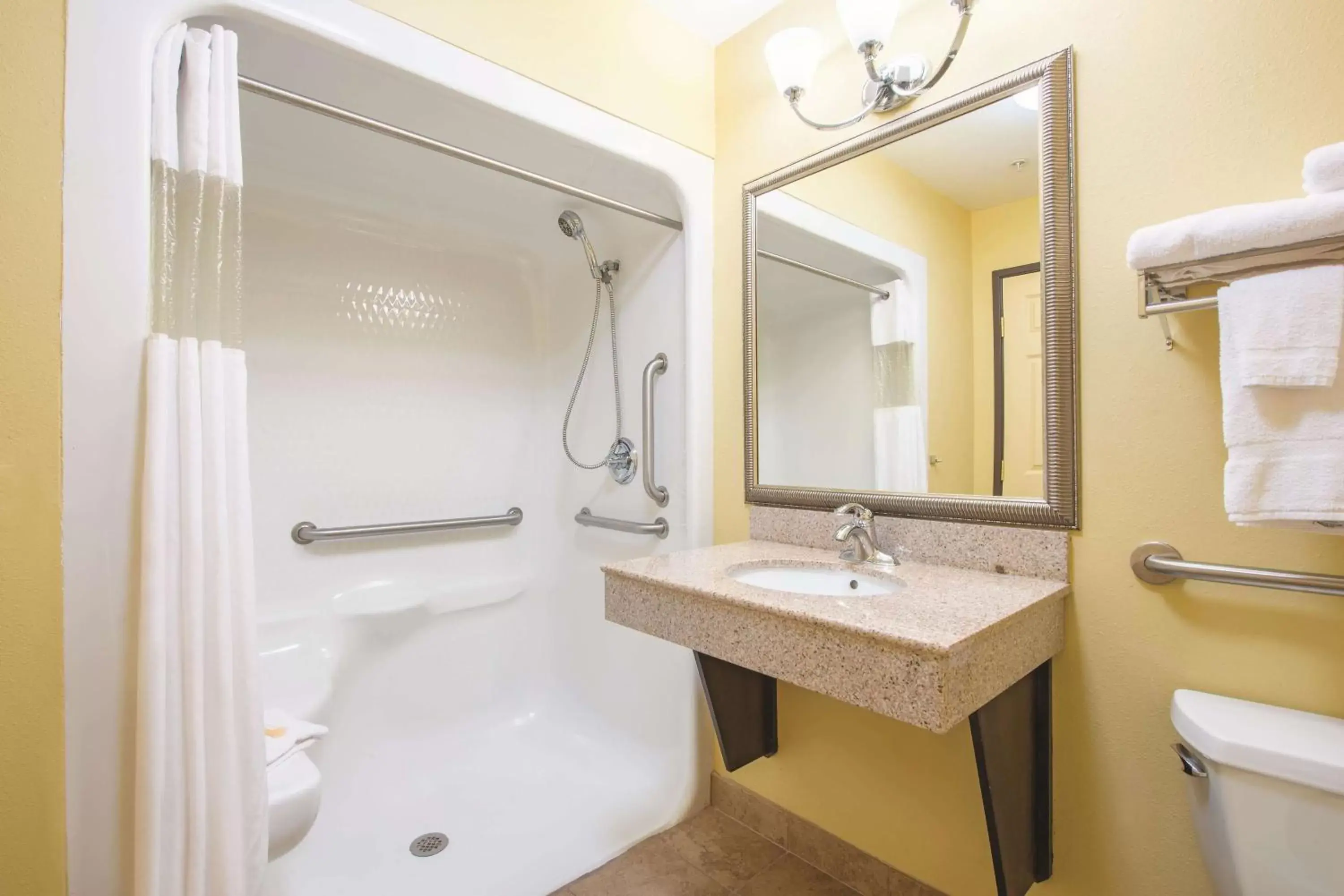 Photo of the whole room, Bathroom in La Quinta by Wyndham Tulsa Airport / Expo Square