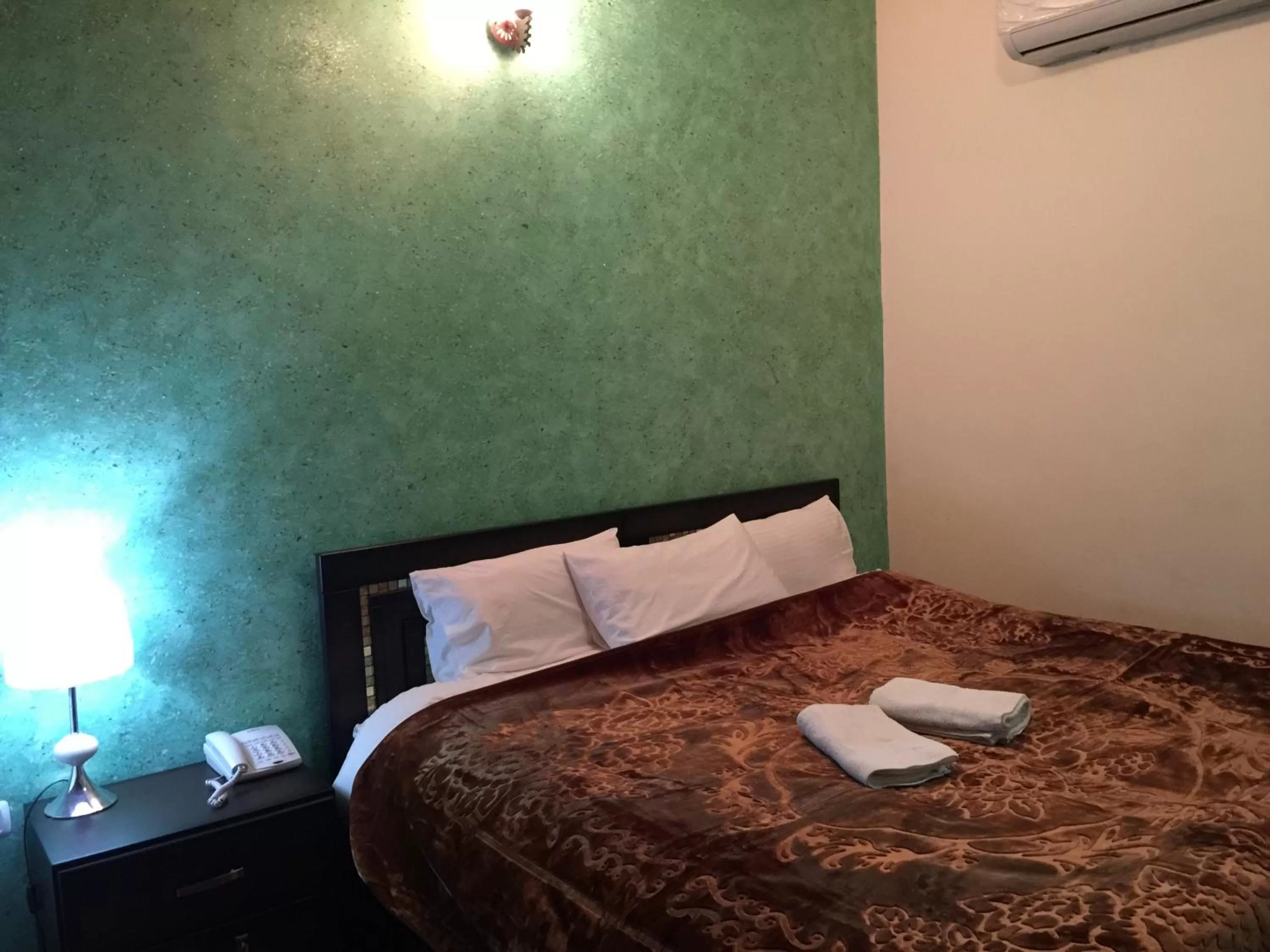 Shower, Bed in Isra Hotel