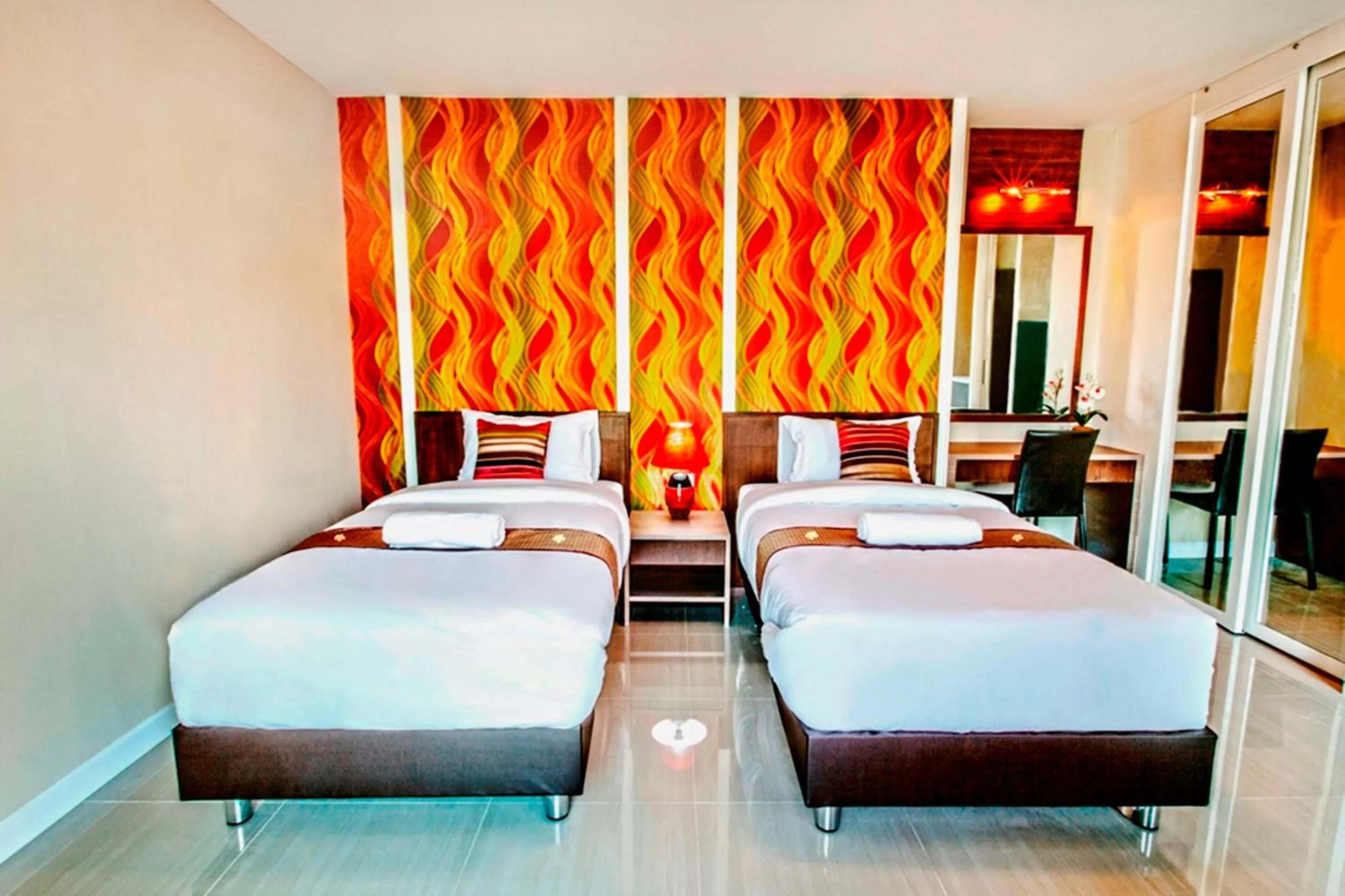 Photo of the whole room, Bed in The Aim Sathorn Hotel
