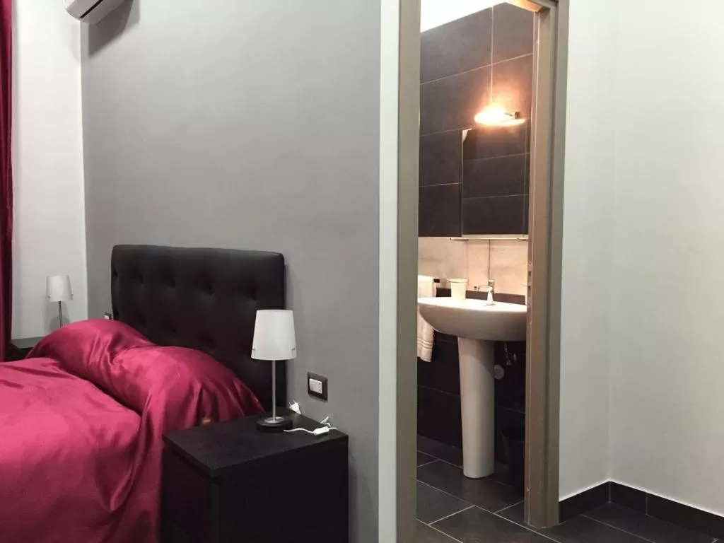 Bed in B&B Napoli Binario 1