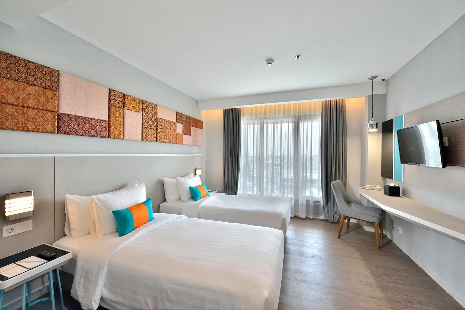 Deluxe Twin Room in THE 1O1 Palembang Rajawali