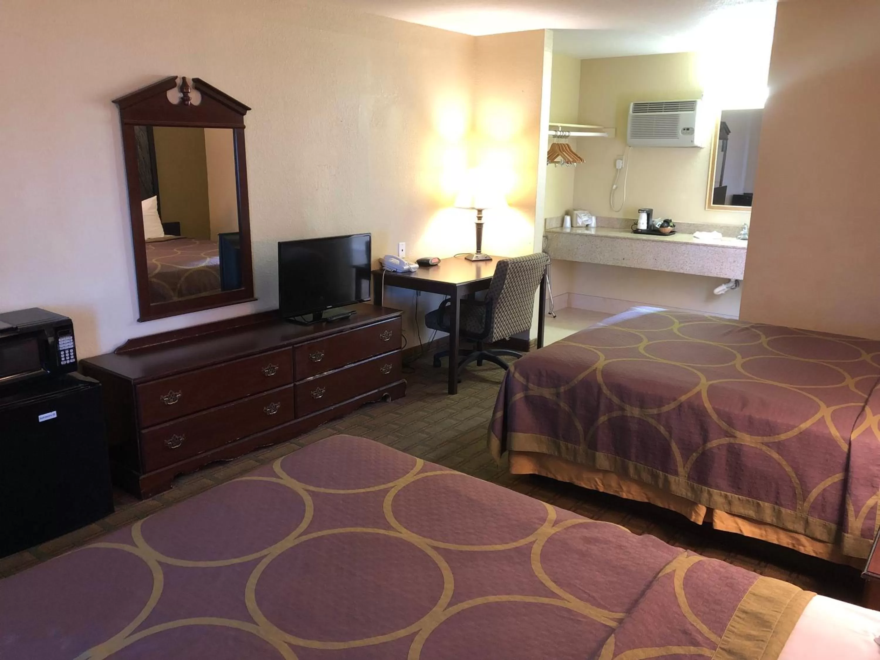 Bed in Super 8 by Wyndham Corning