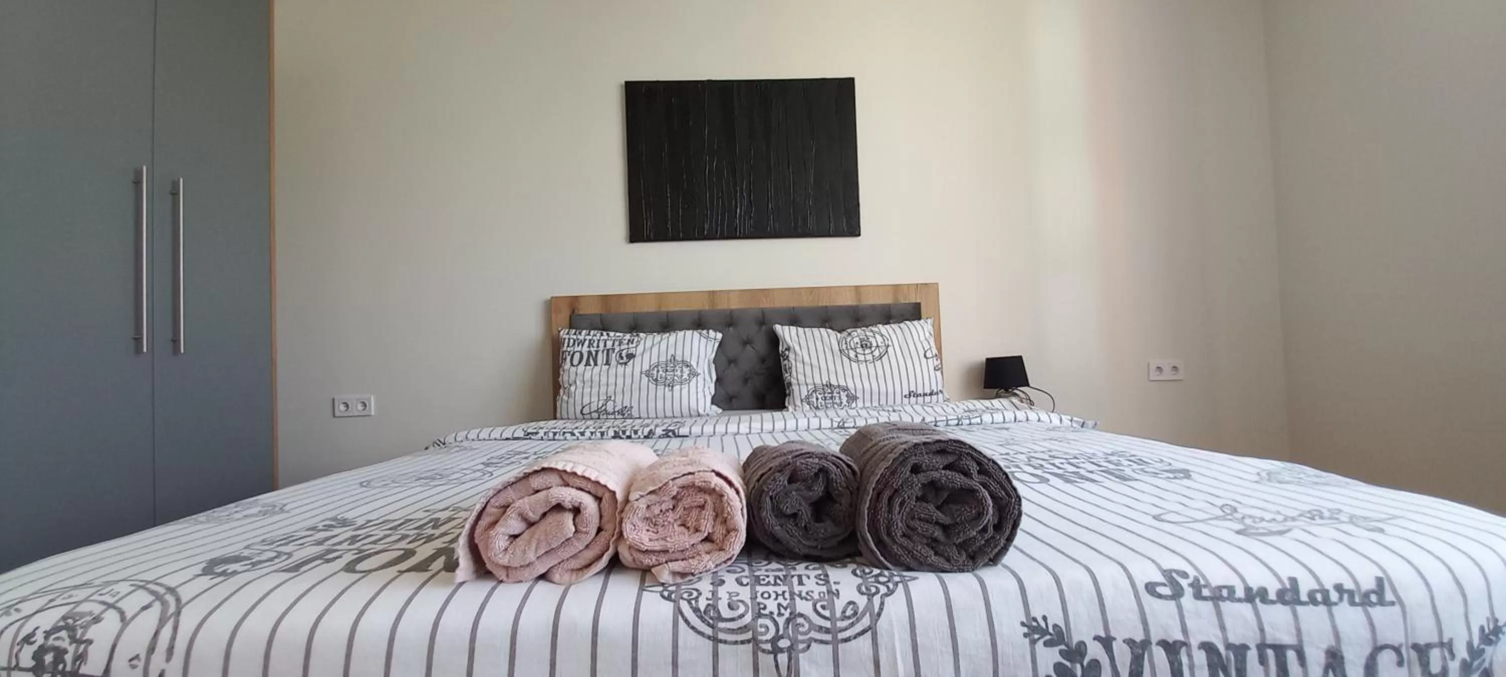 Bed in WOW Apartments