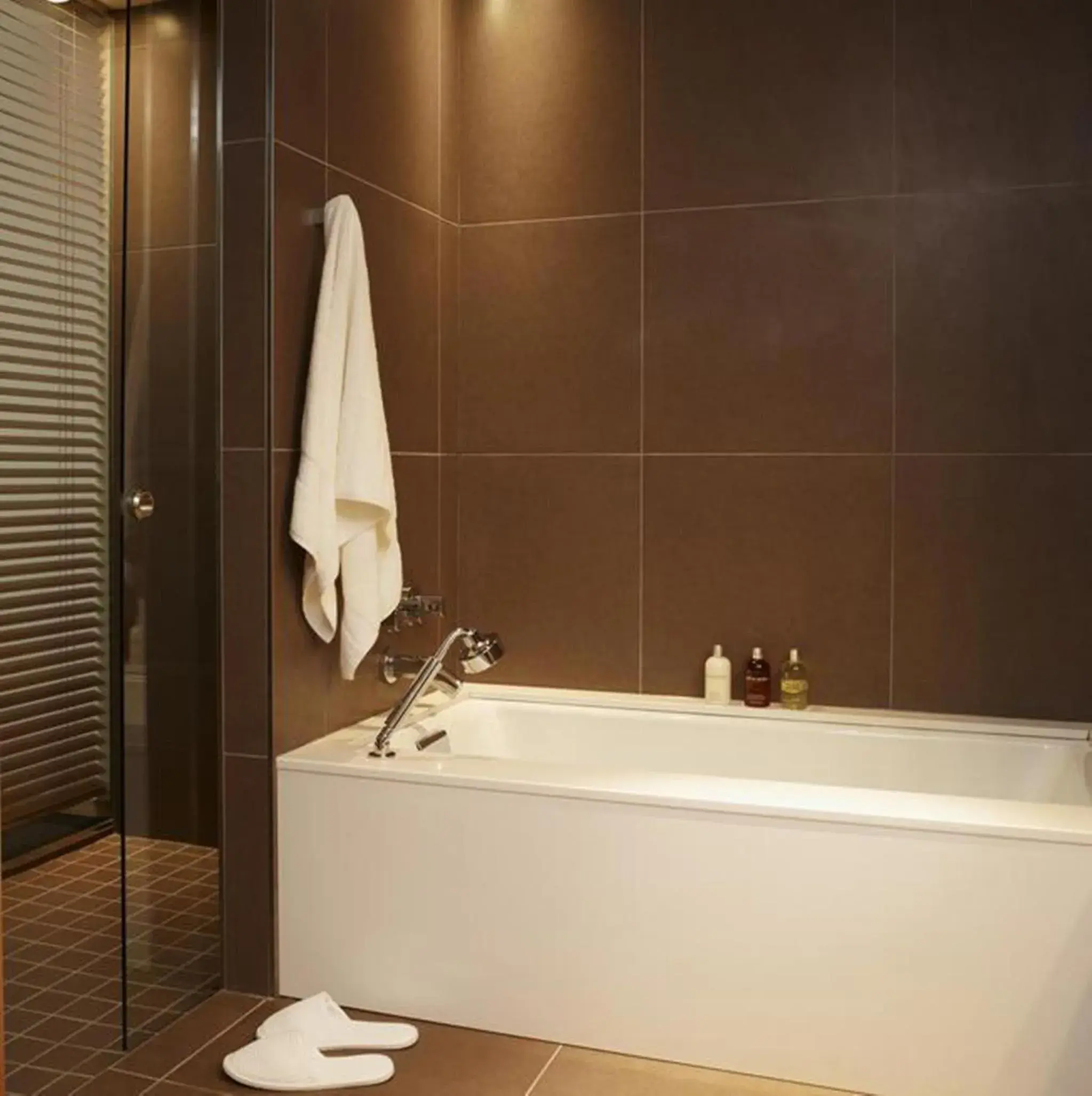 Bathroom in Le Germain Hotel Maple Leaf Square