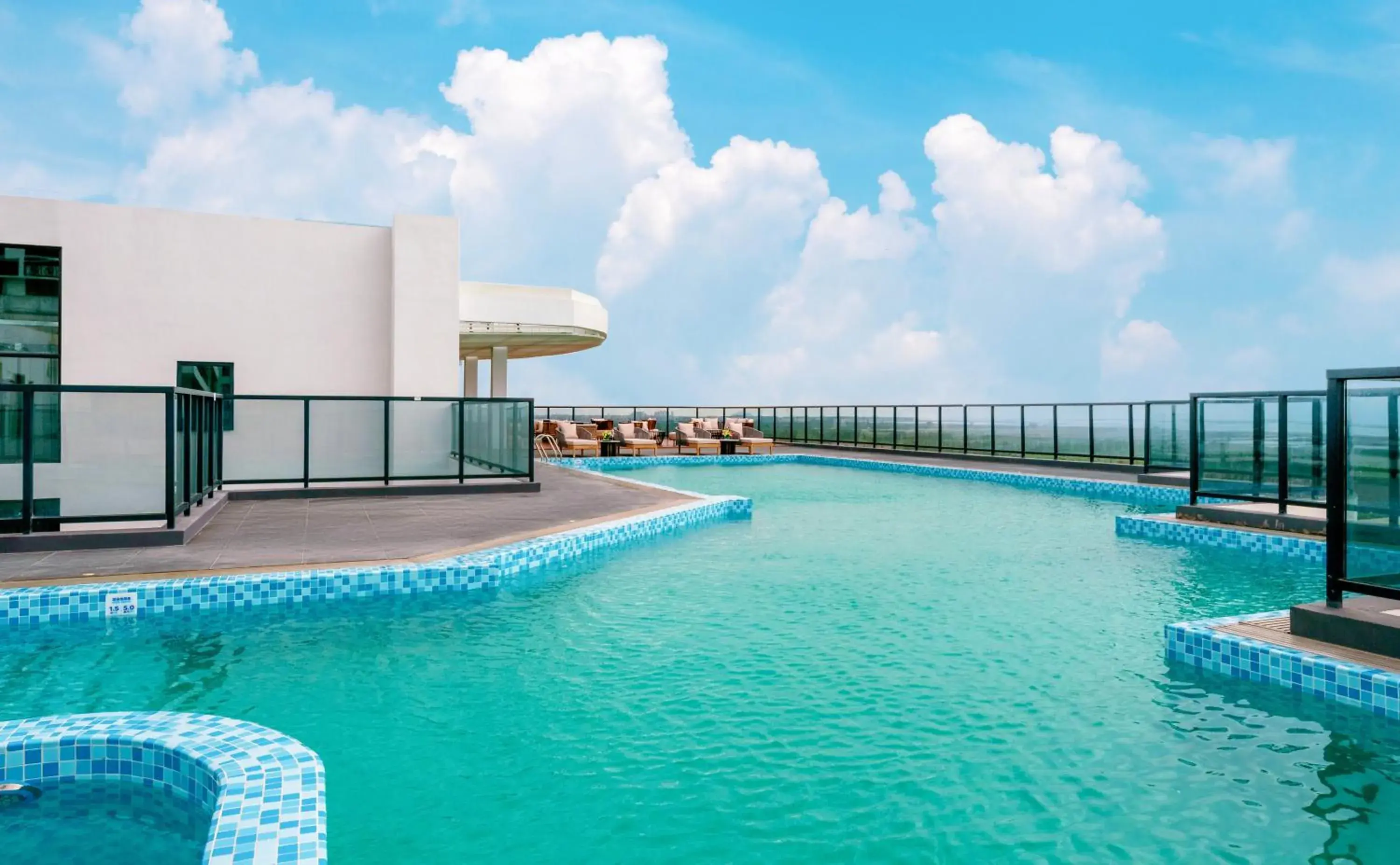 Swimming Pool in Holiday Inn Express Jiangmen Yinhu Bay, an IHG Hotel