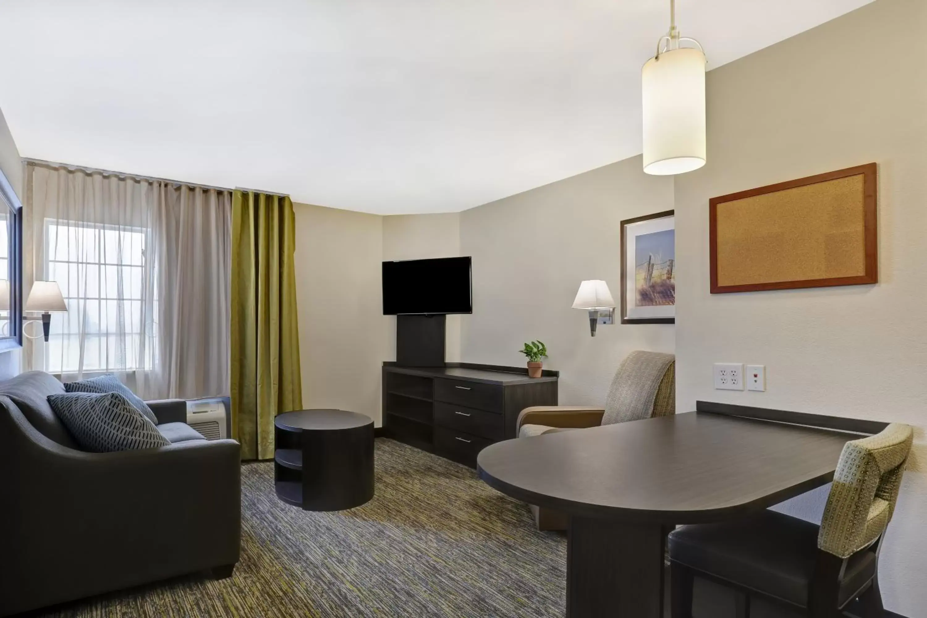 Bedroom, Seating Area in Candlewood Suites Indianapolis - South, an IHG Hotel