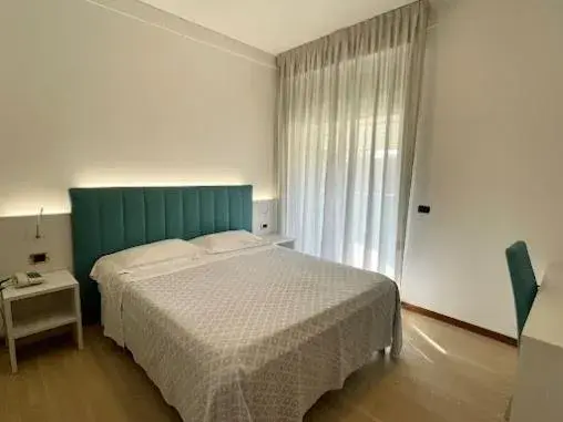 Guests, Bed in Hotel Corallo
