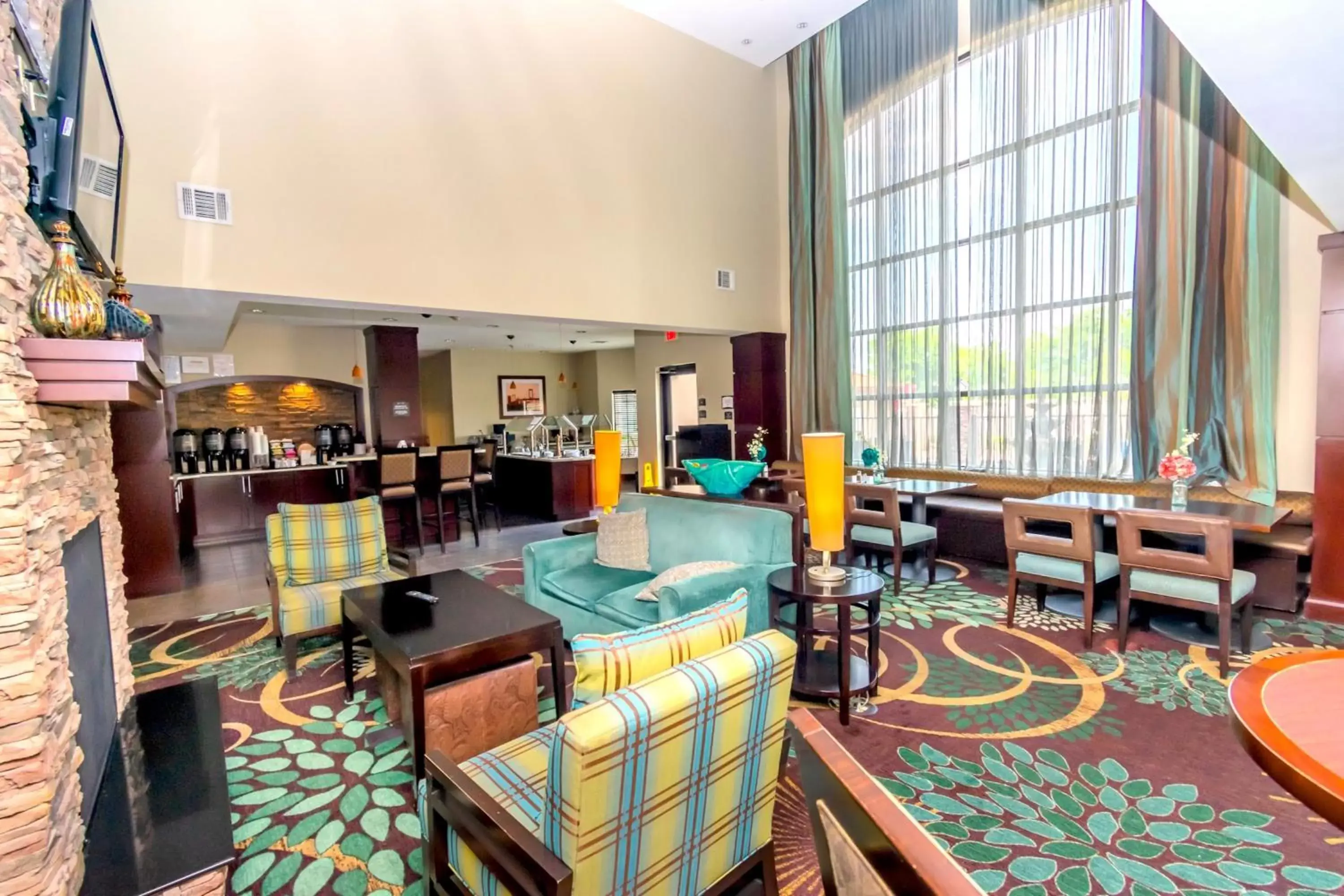 Breakfast, Lobby/Reception in Staybridge Suites Houston - IAH Airport, an IHG Hotel