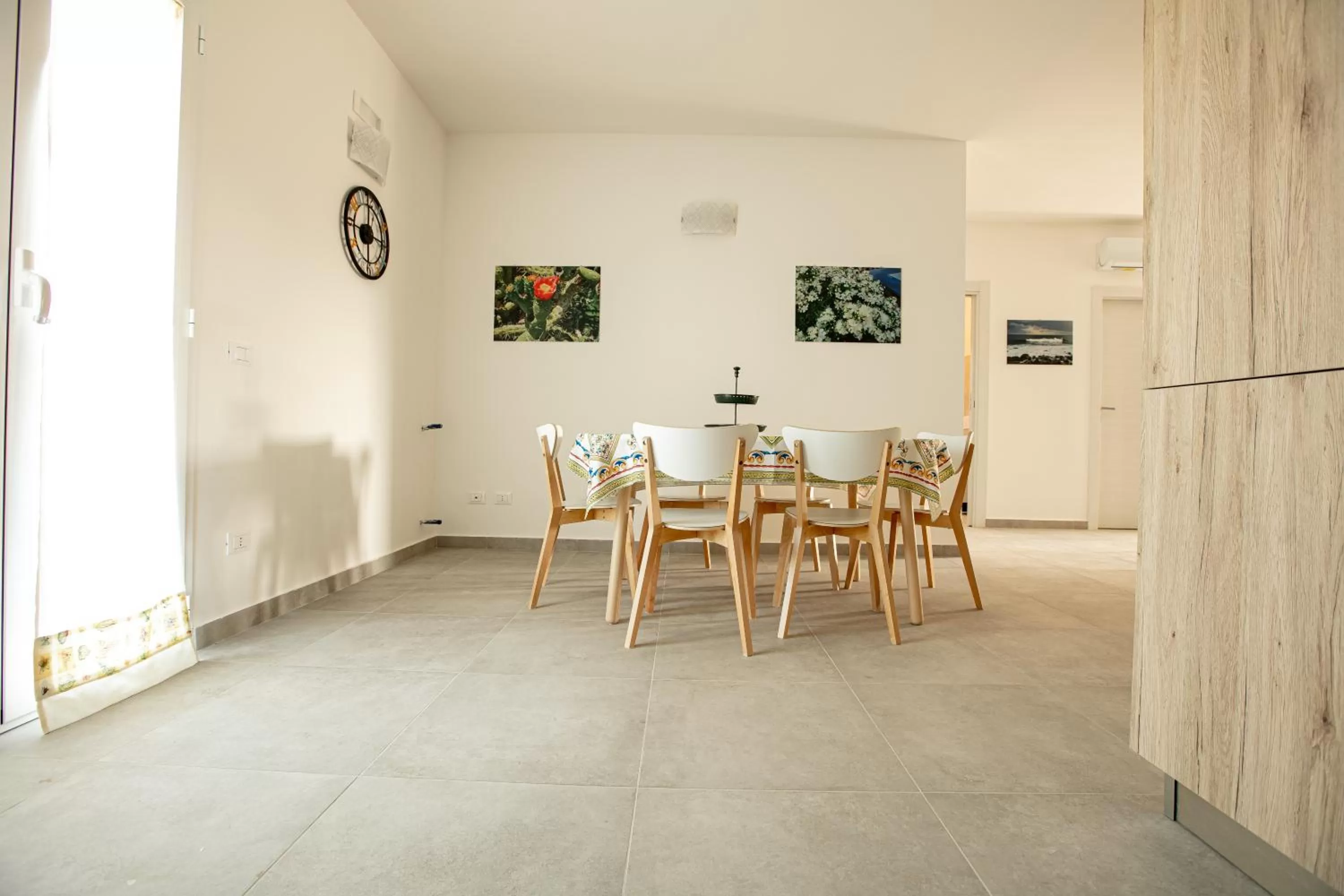 Living room, Dining Area in Etnamare Brucoli