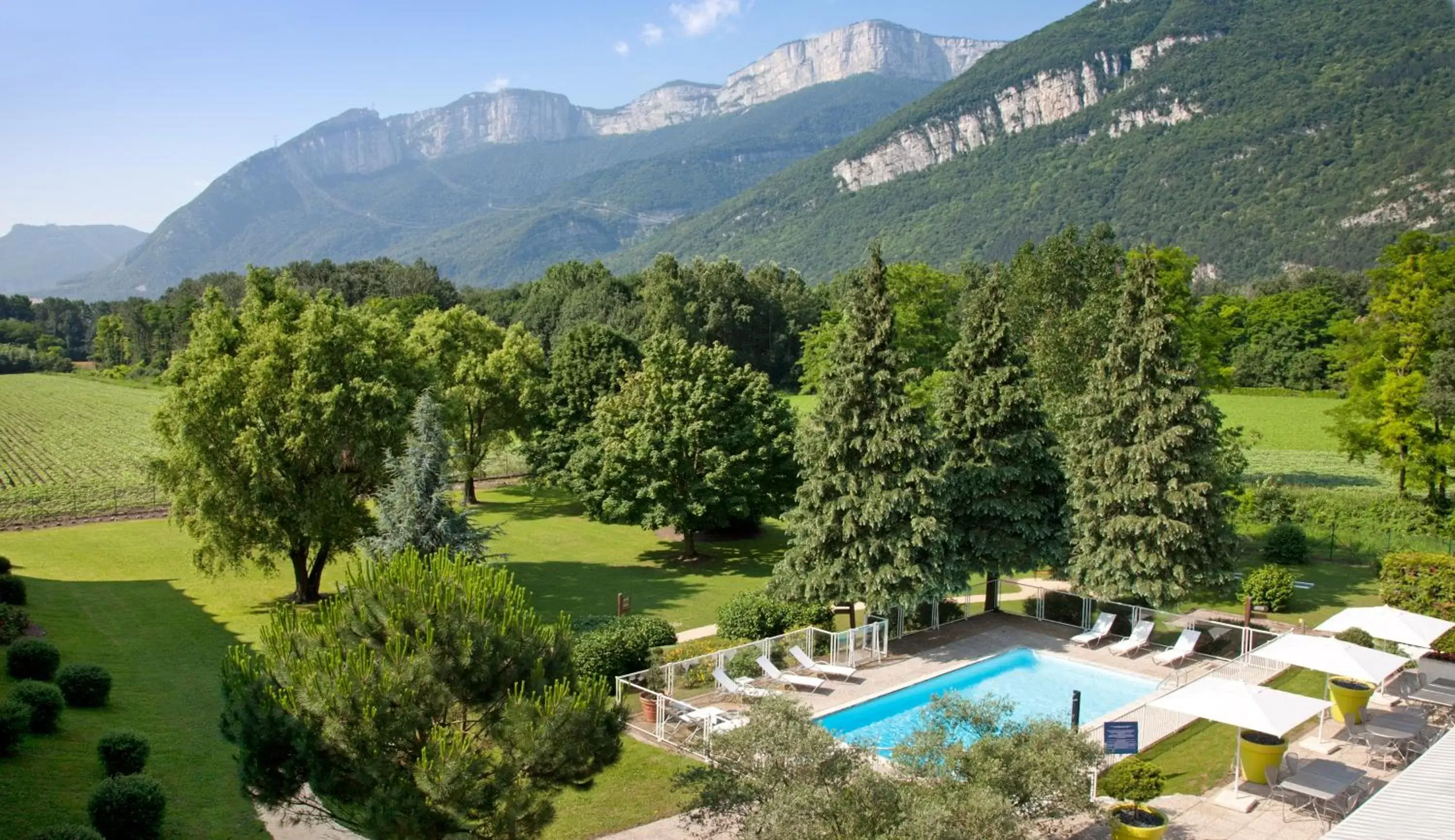 Swimming pool, Pool View in Novotel Grenoble Nord Voreppe