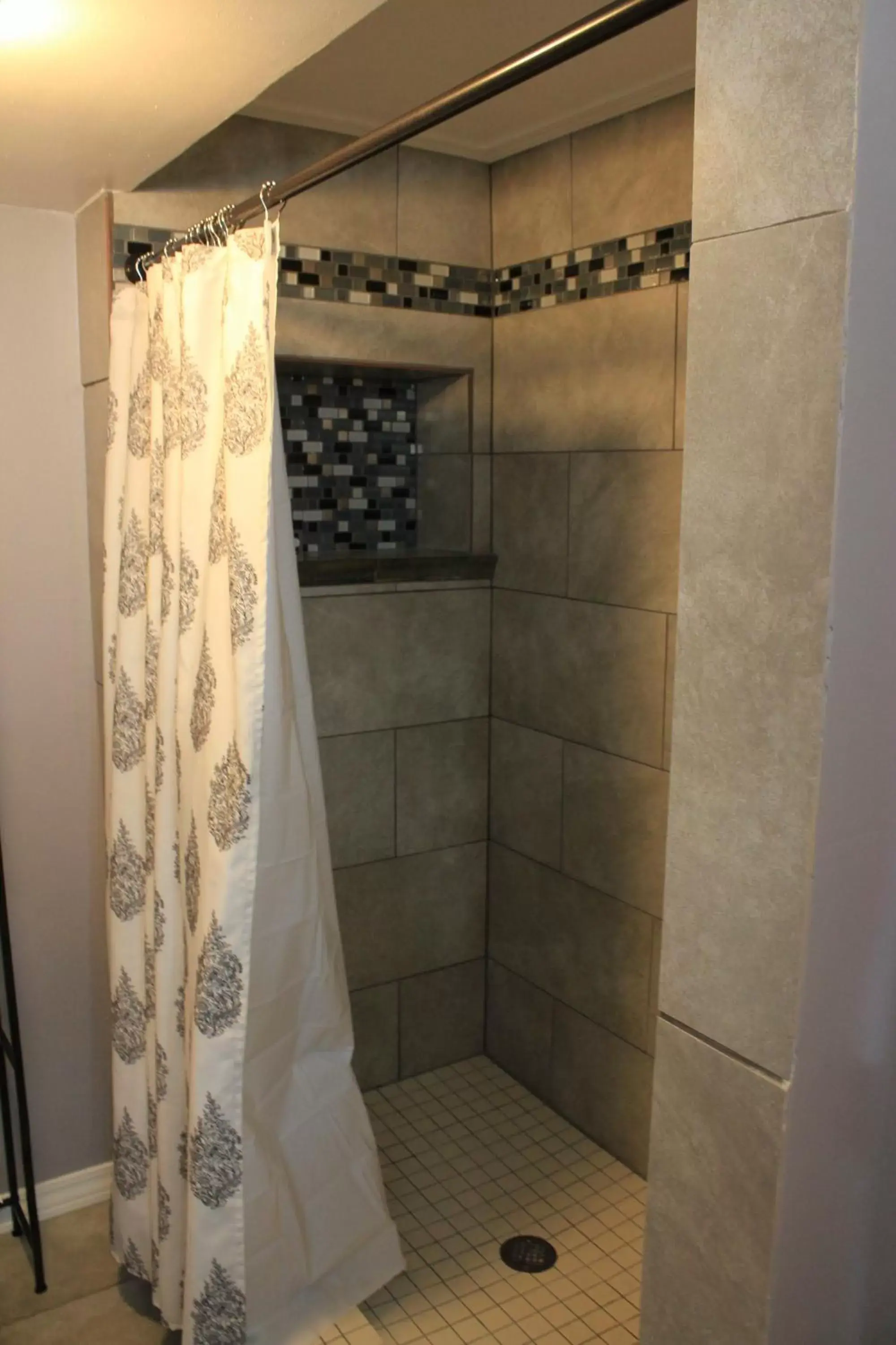 Shower, Bathroom in Brydan Suites