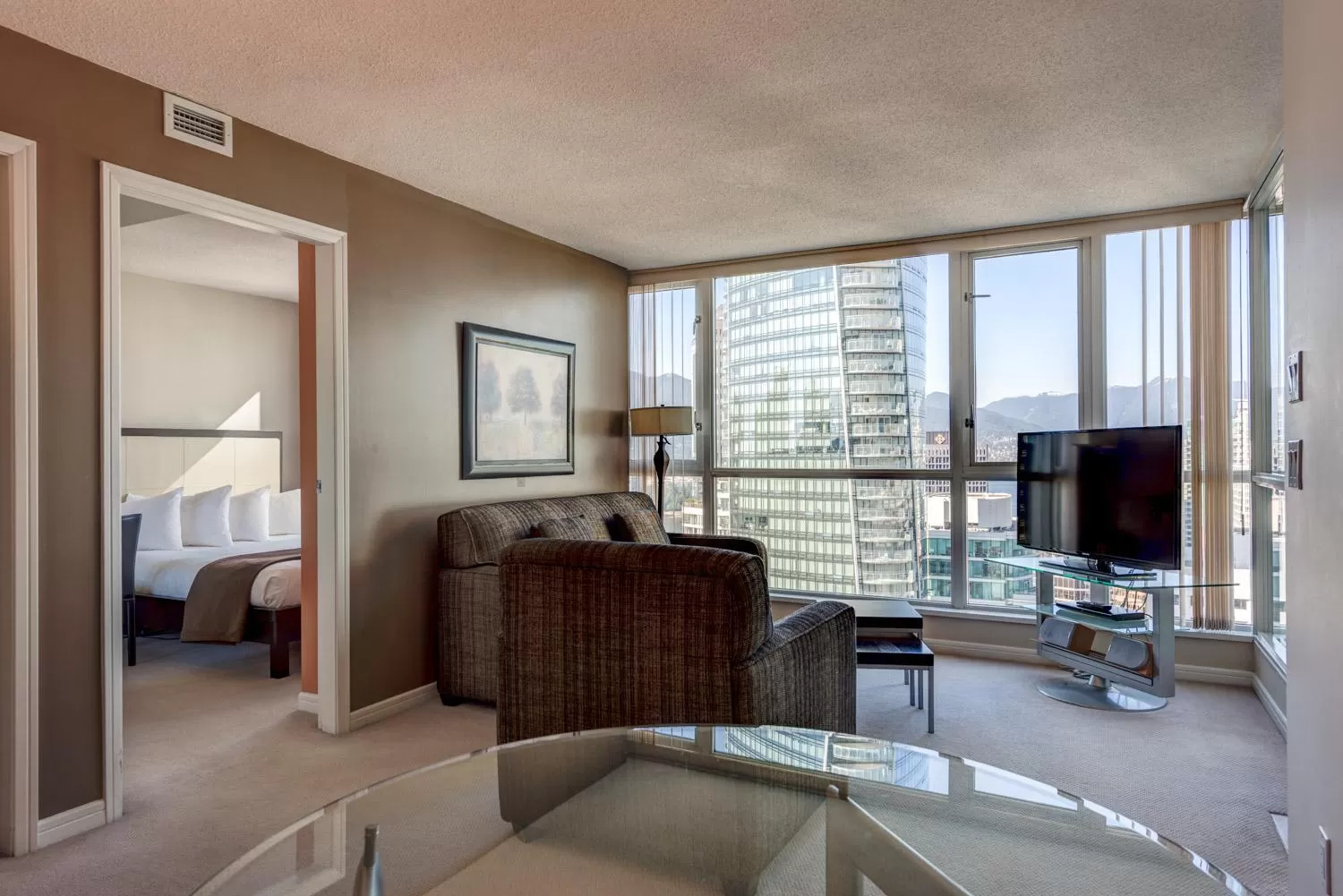 Living room, Bed in Carmana Hotel & Suites