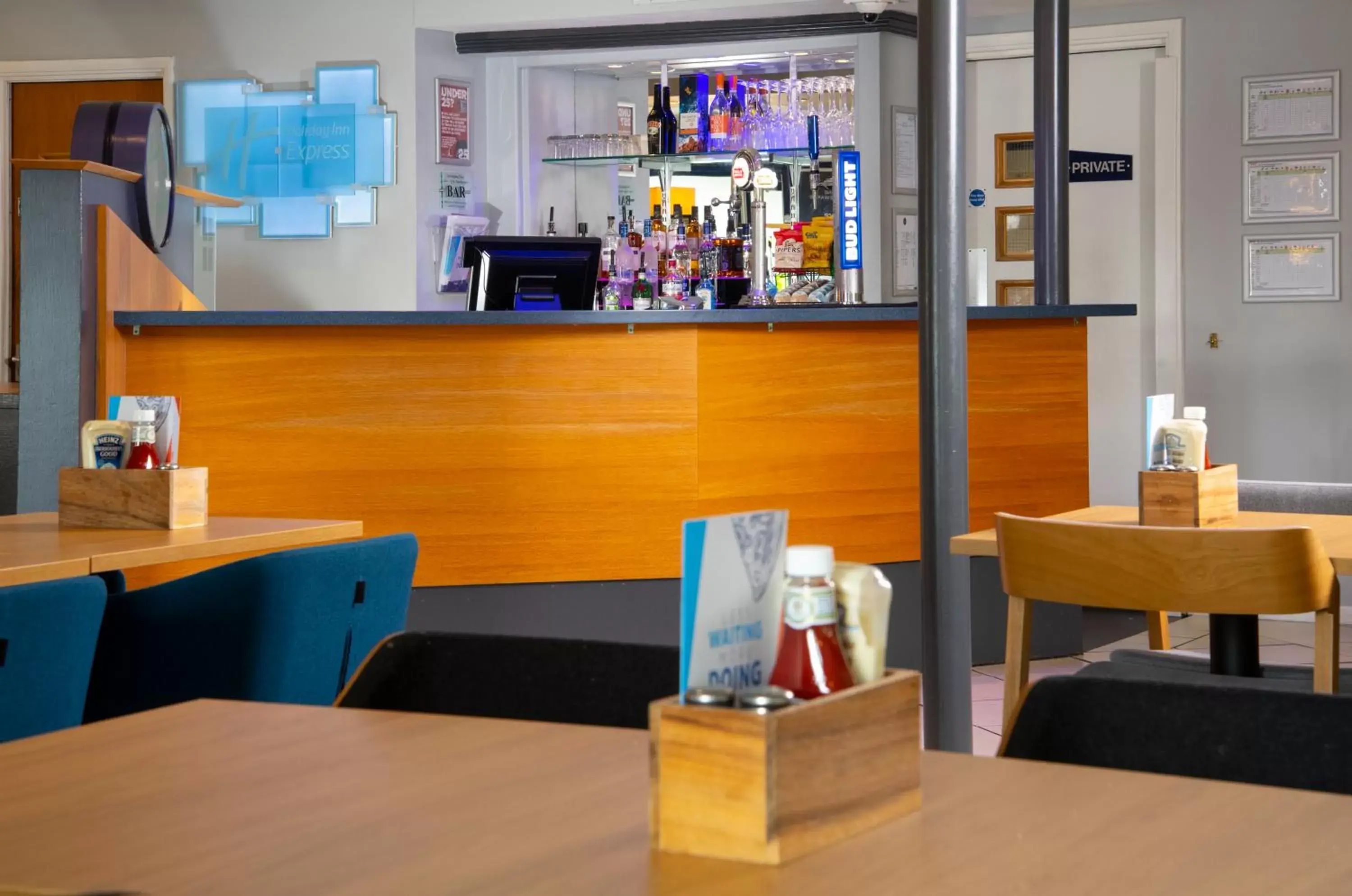 Lounge or bar in Holiday Inn Express Peterborough by IHG Lounge or bar in Holiday Inn Express Peterborough by IHG