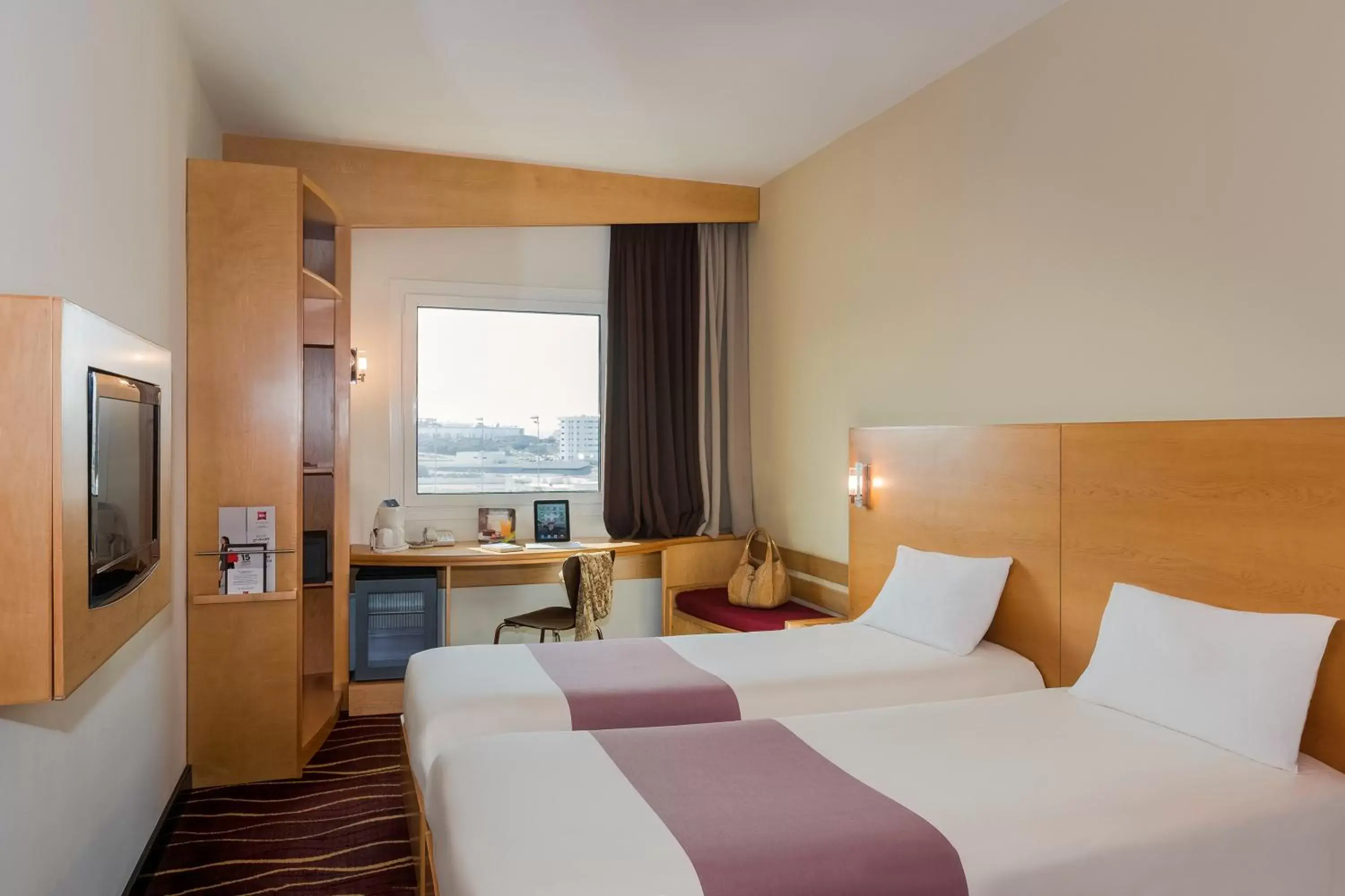 Bed in ibis Sharq