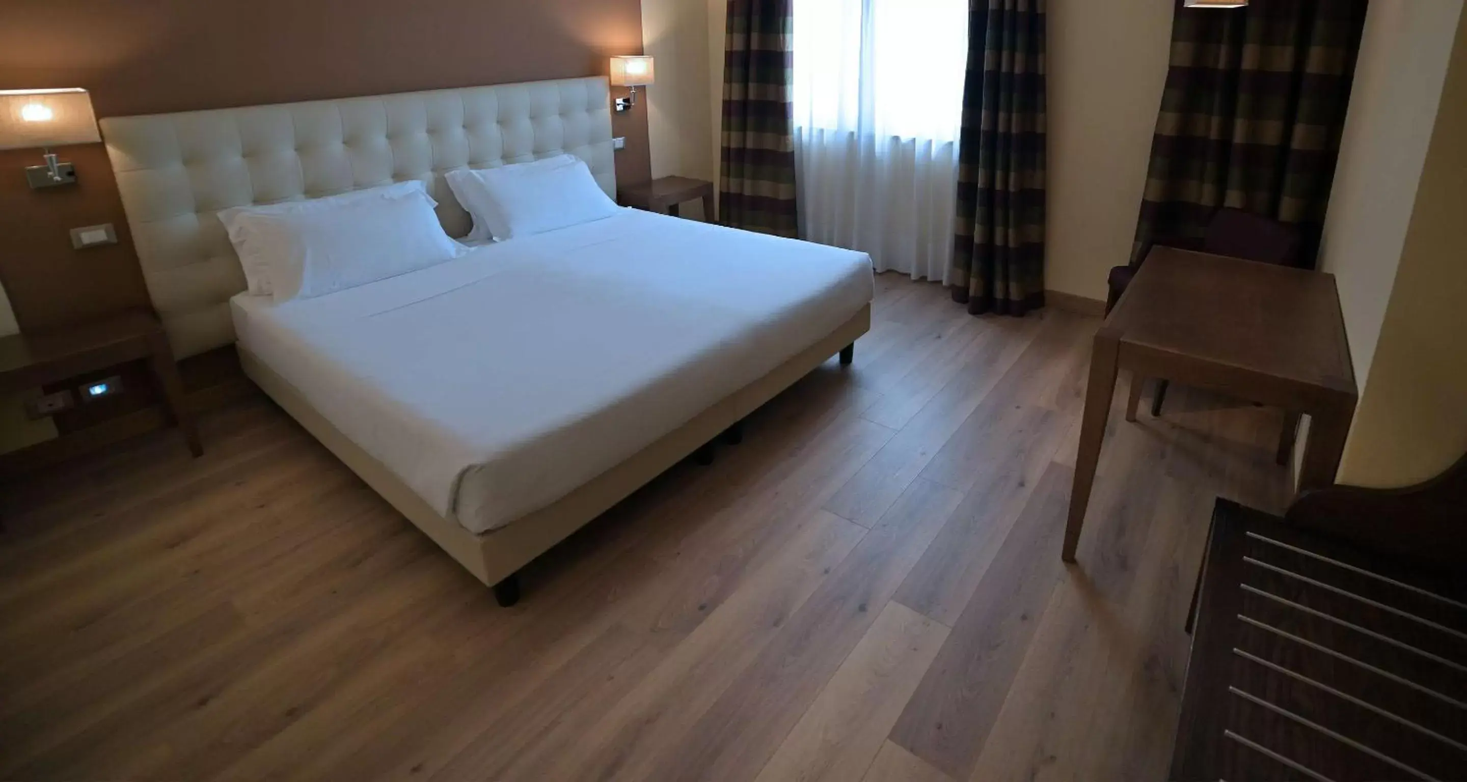 Bed in Best Western Grand Hotel Guinigi