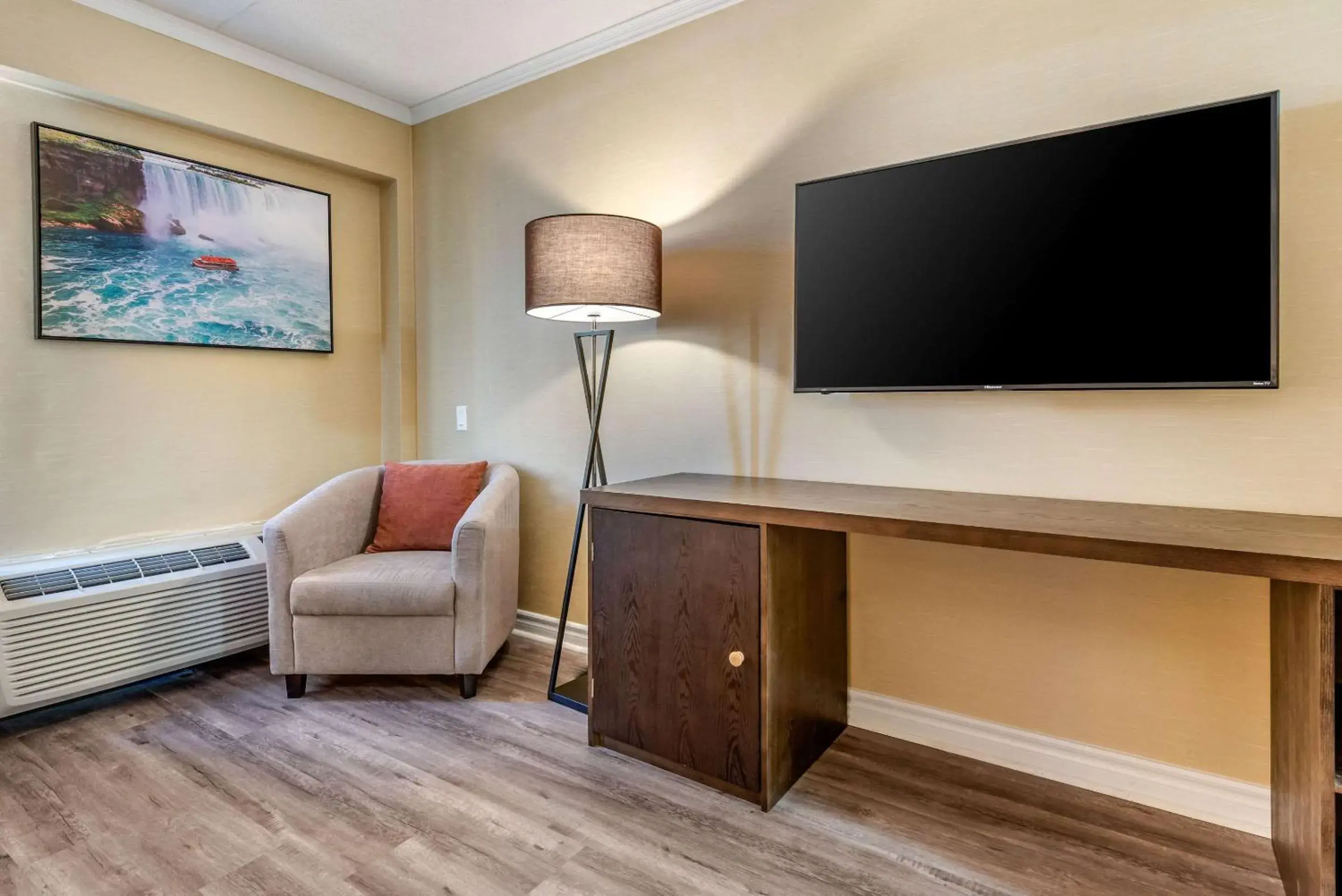 Photo of the whole room, TV/Entertainment Center in Quality Inn and Suites