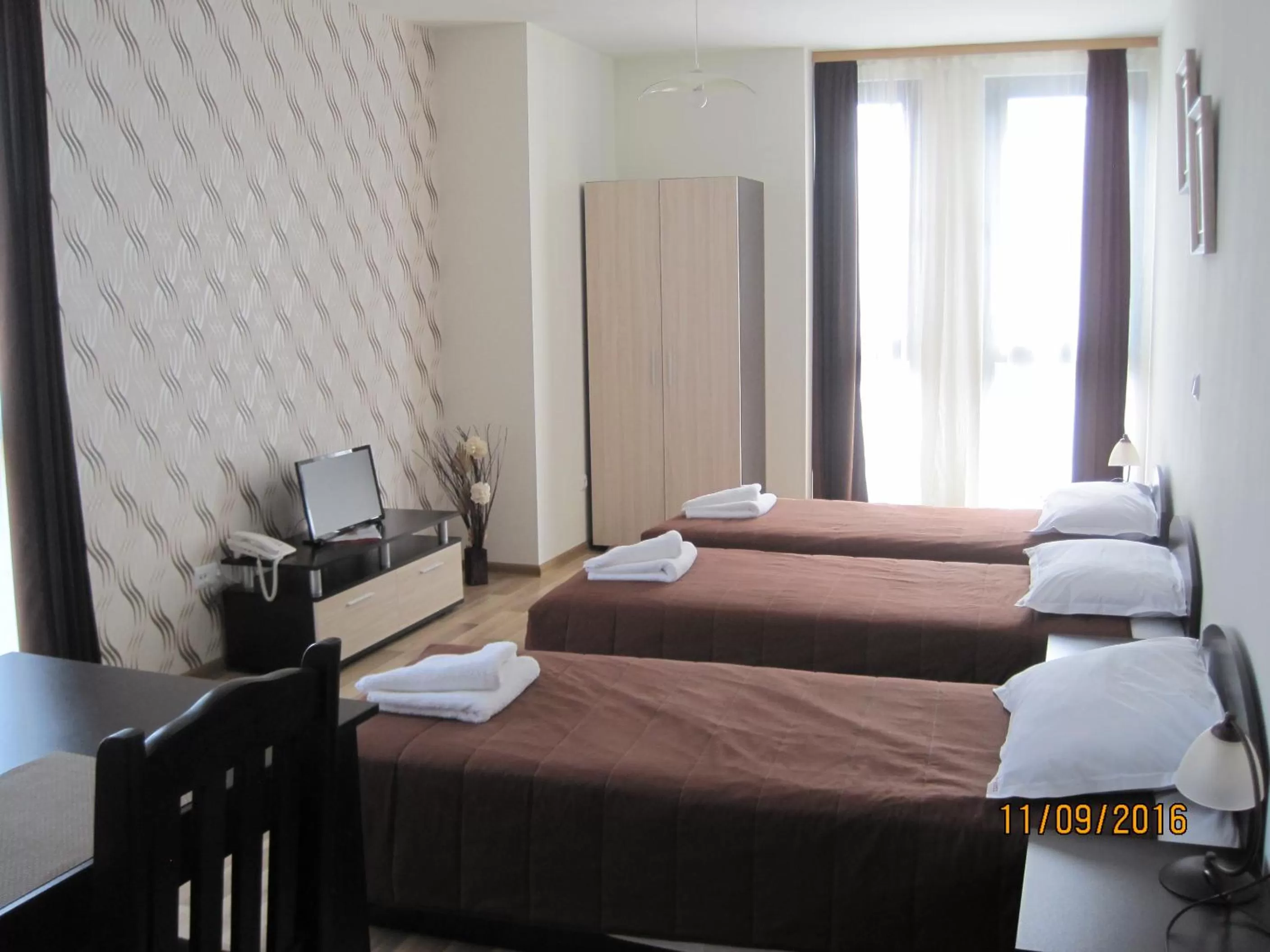 Bed in Apart Hotel Rosen