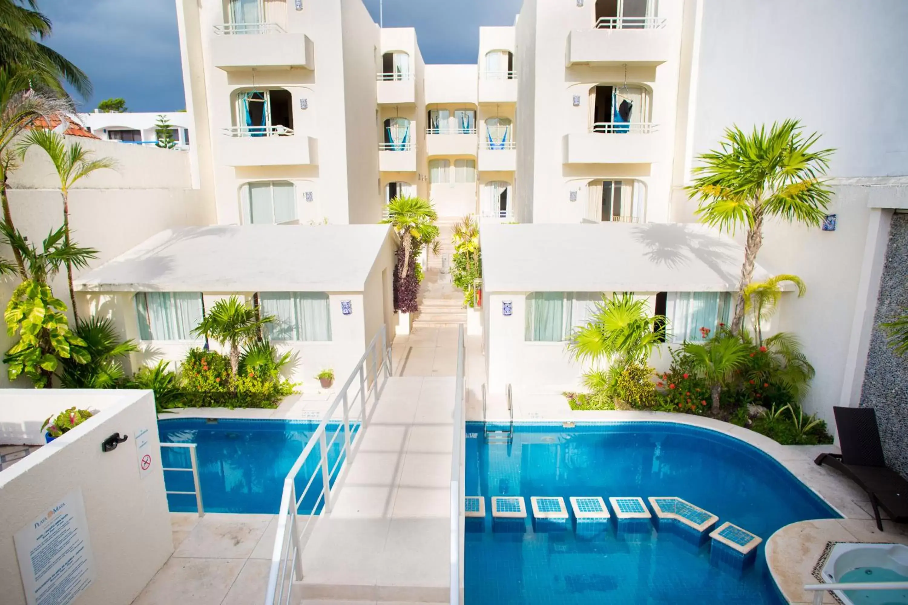 Property building, Swimming Pool in Playa Maya by MIJ - Beachfront Hotel