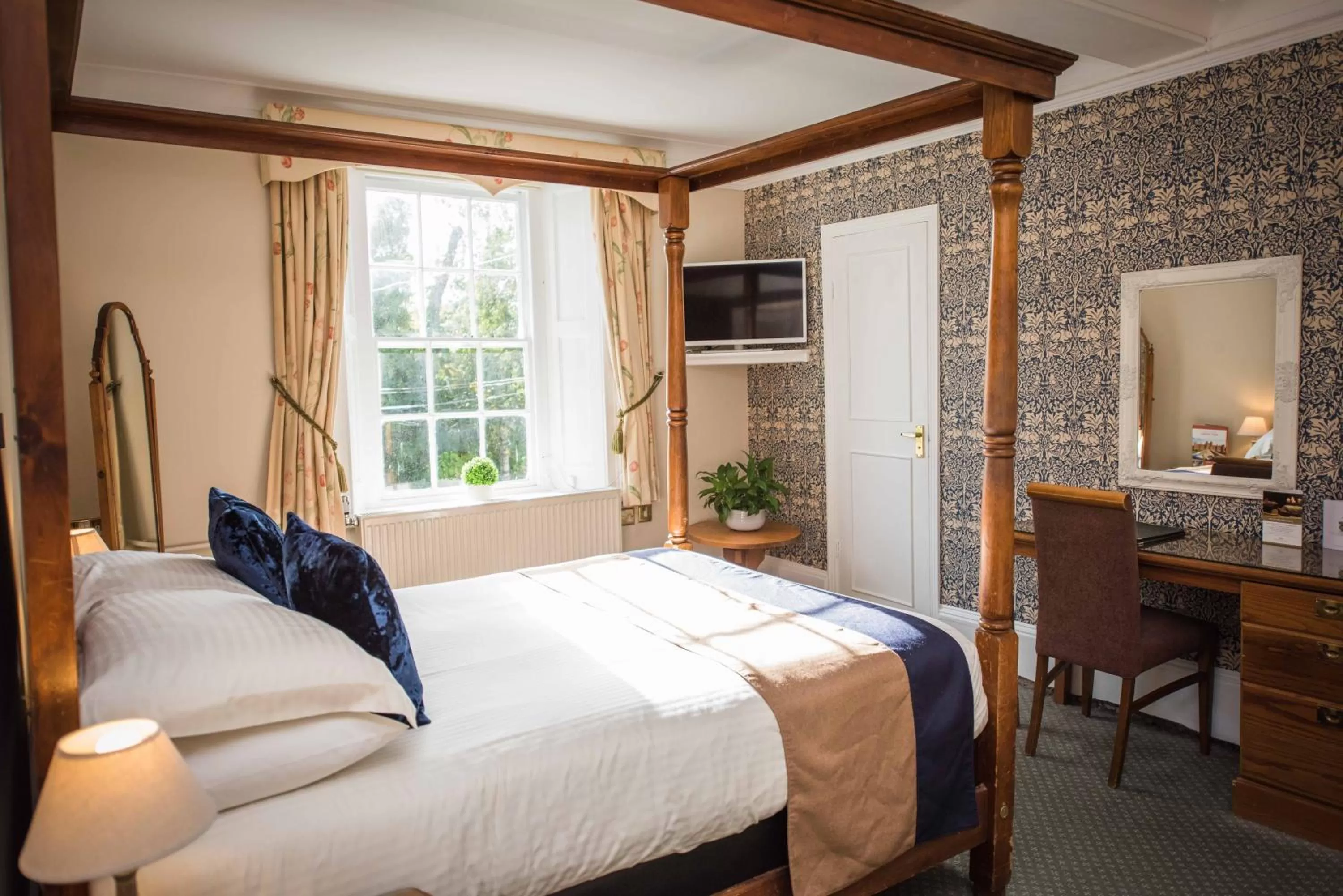 Bed in Flackley Ash Country House Hotel