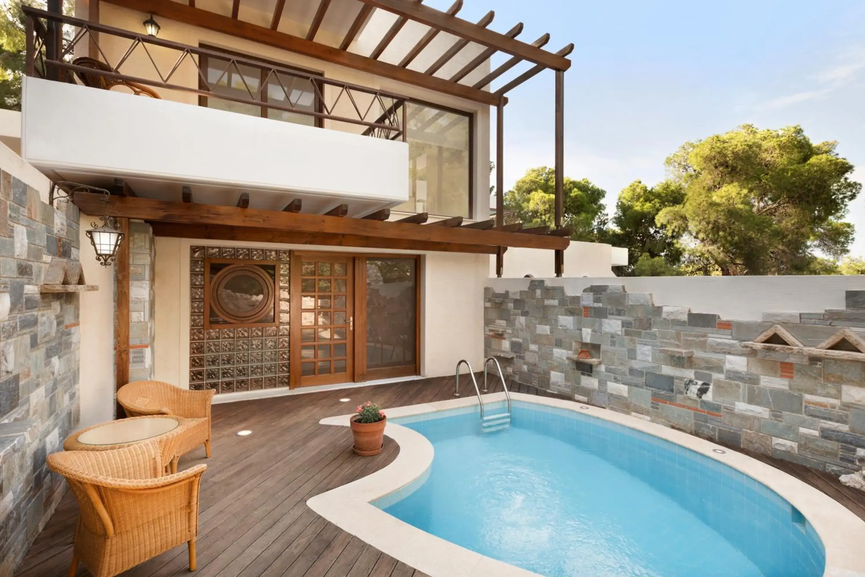 Balcony/Terrace, Swimming Pool in Ramada Loutraki Poseidon Resort