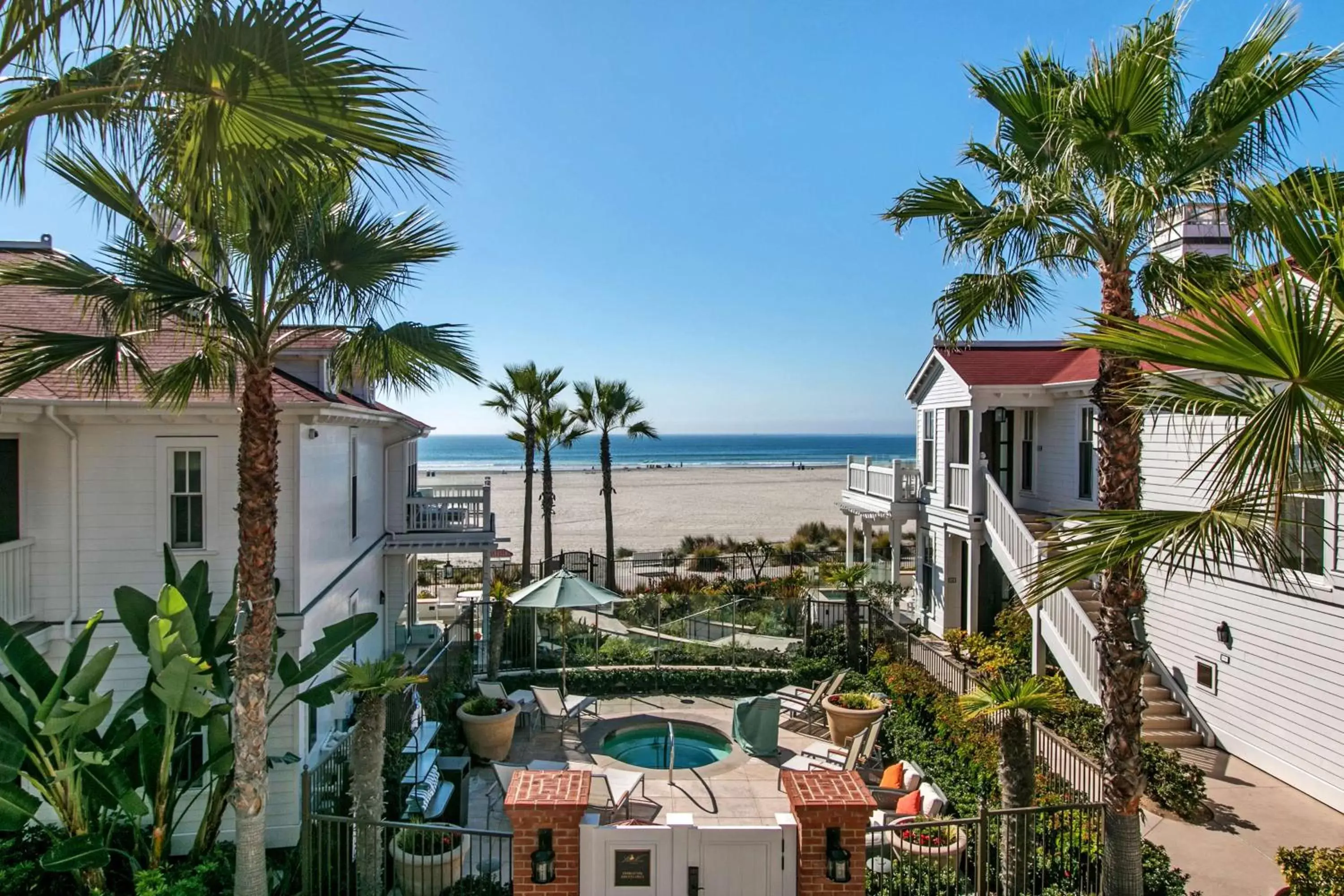 Bed, Pool View in Hotel del Coronado, Curio Collection by Hilton