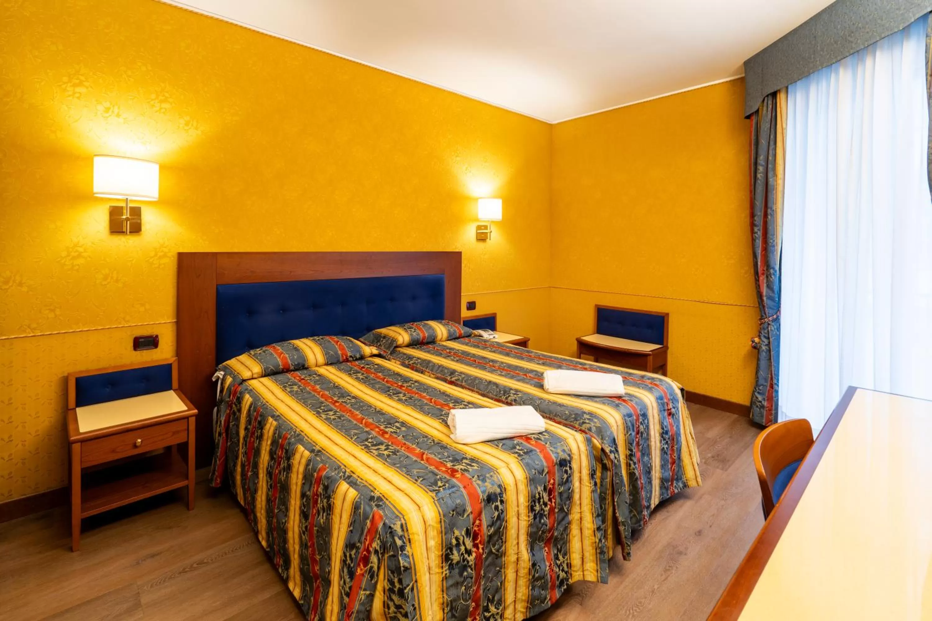 Bed in Hotel Des Etrangers