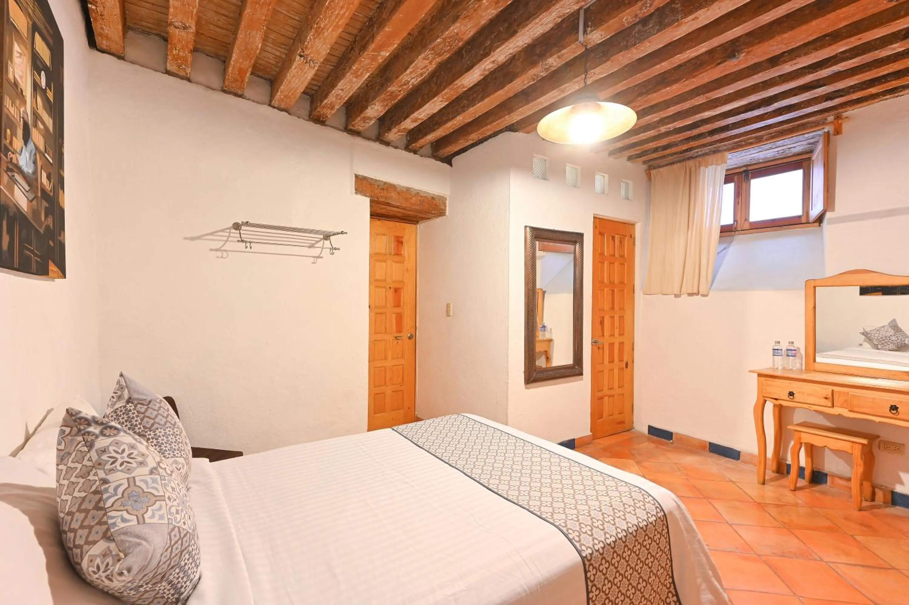 Bed in Hotel Meson Cuevano