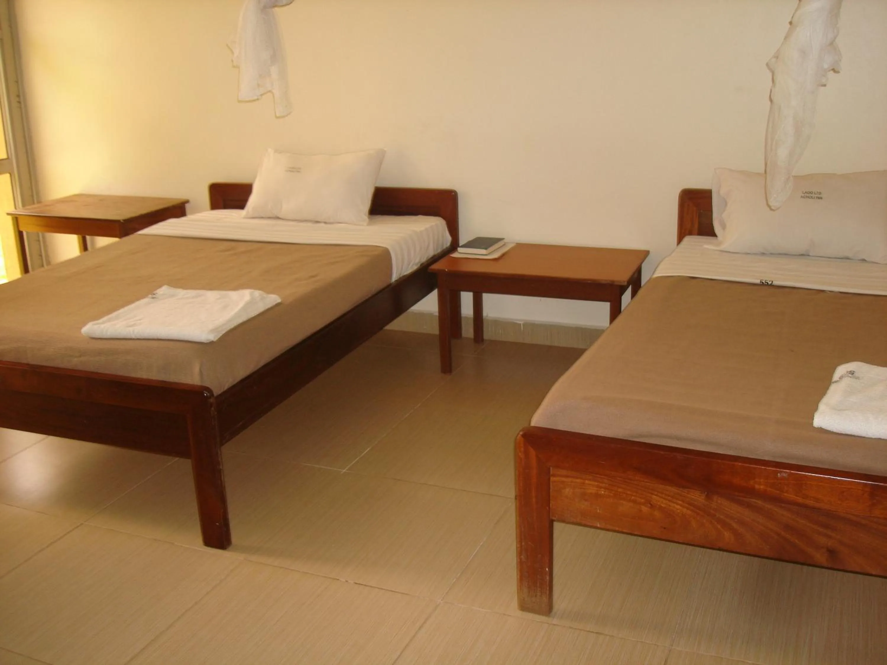 Bedroom in Acholi Inn