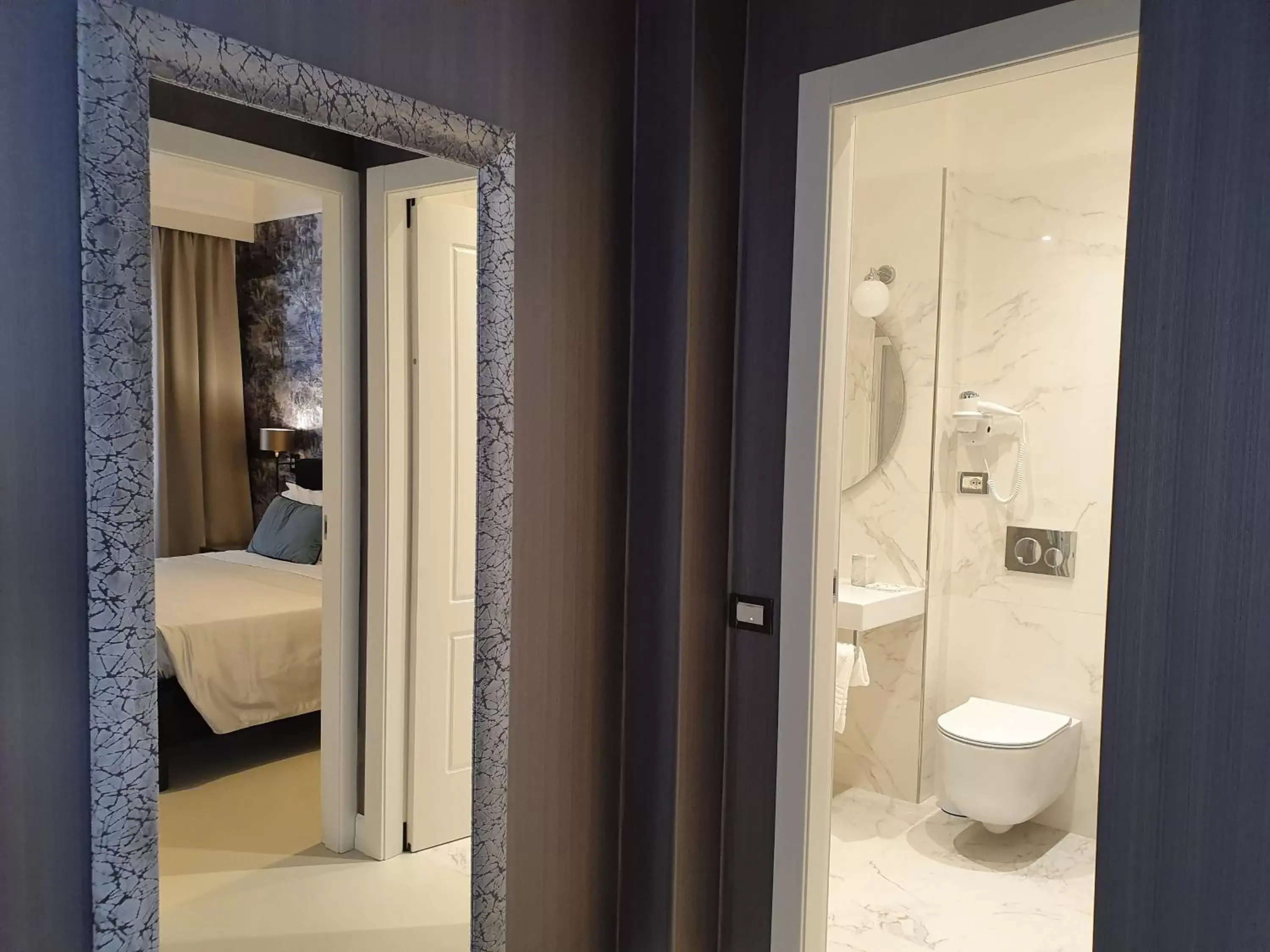 Bathroom in Hotel Maxim Axial