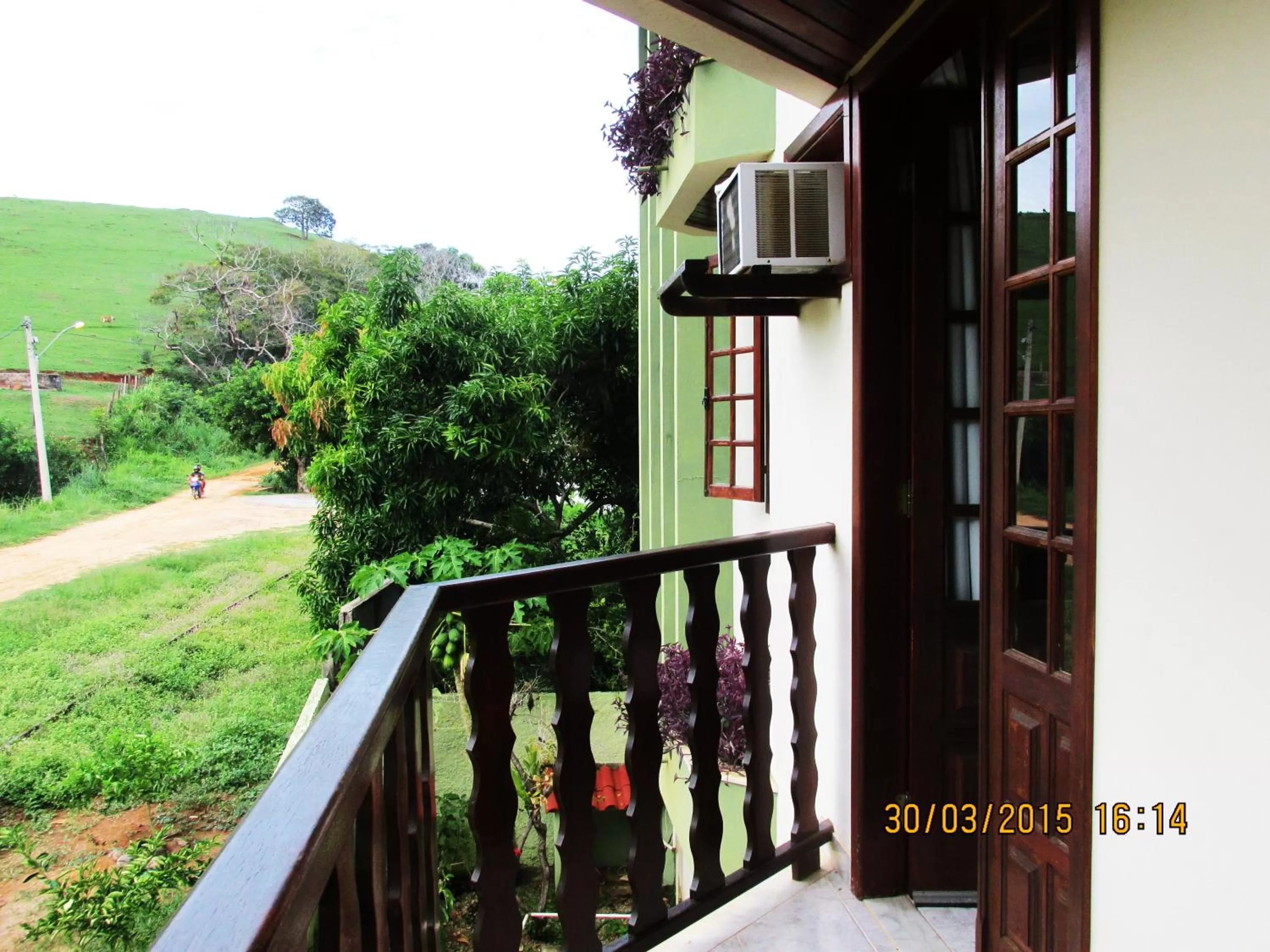 Property building, Balcony/Terrace in Pousada Beija Flor