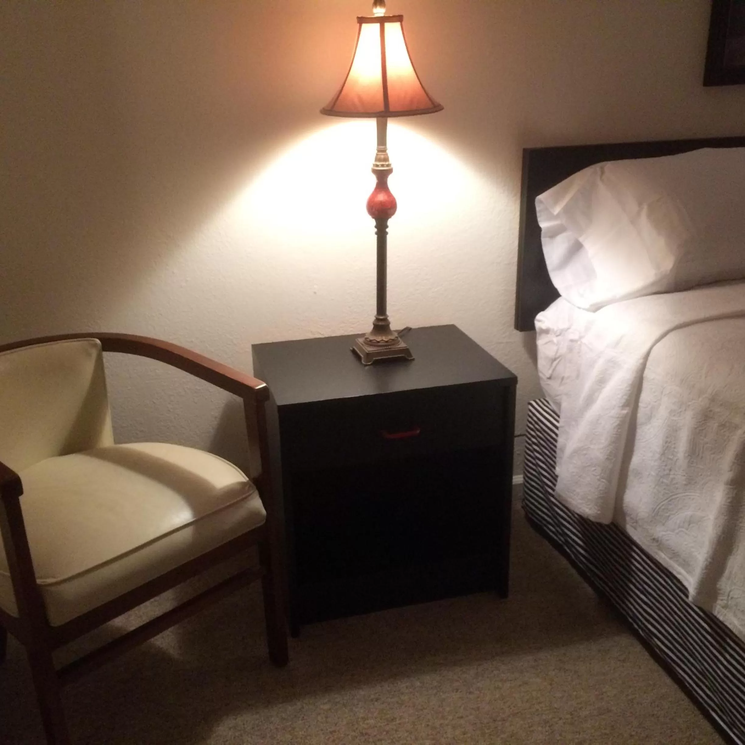 Decorative detail, Bed in Cardinal Inn