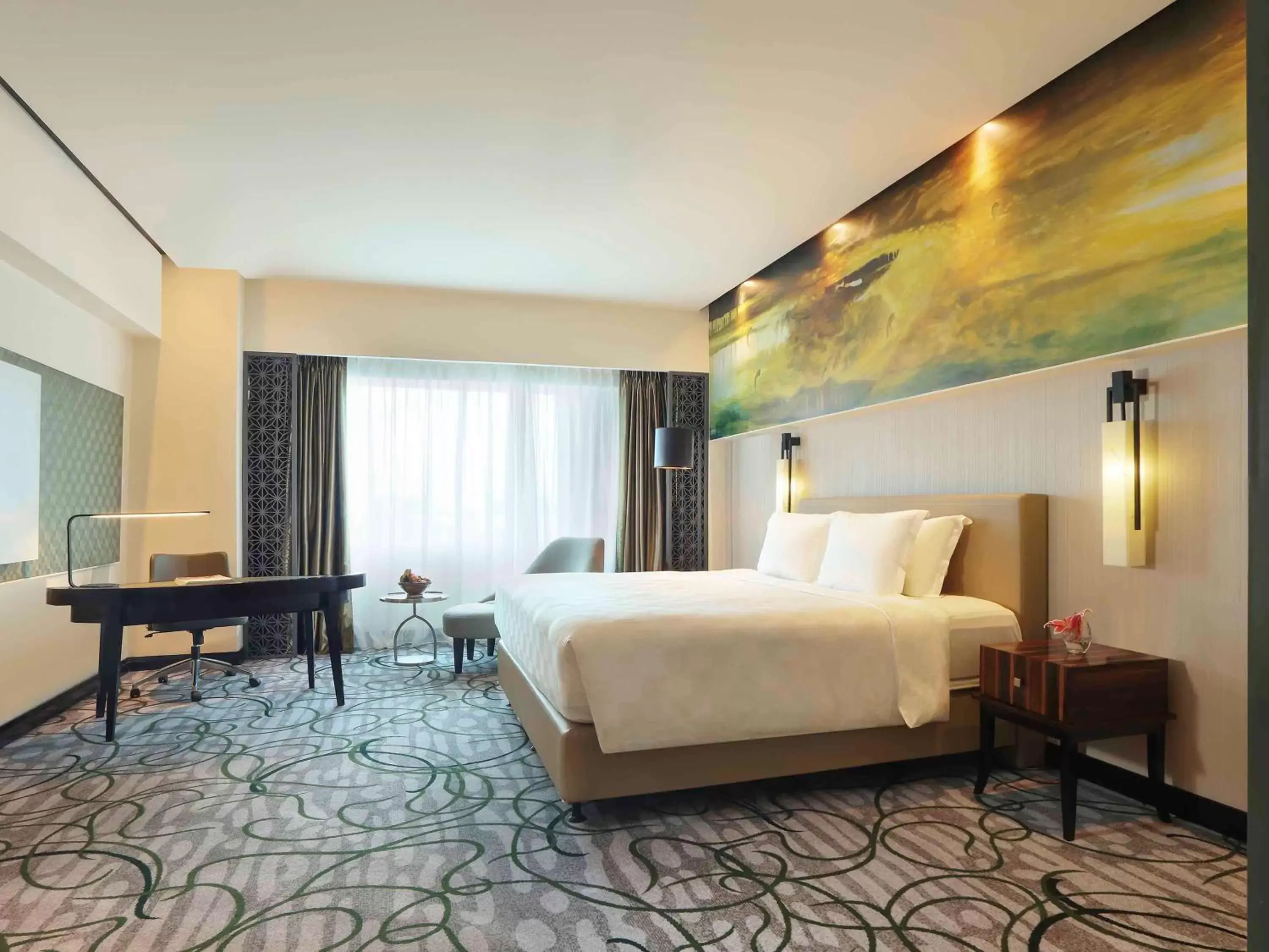 Photo of the whole room, Bed in Grand Mercure Medan Angkasa