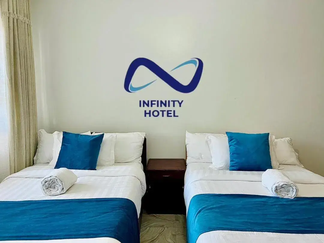 Bed in Infinity Hotel Kampala