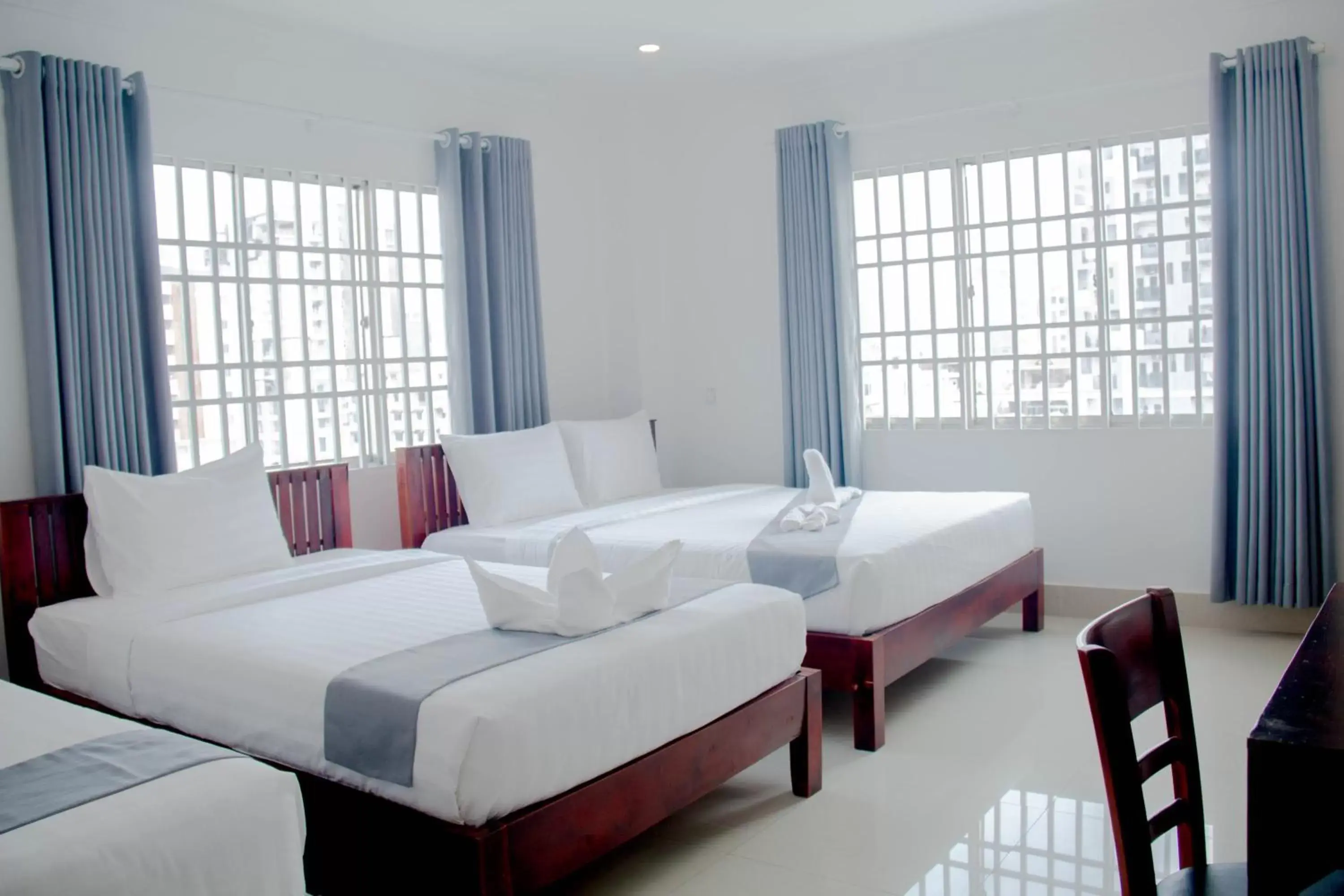 View (from property/room), Bed in White Corner Hotel View (from property/room), Bed in White Corner Hotel