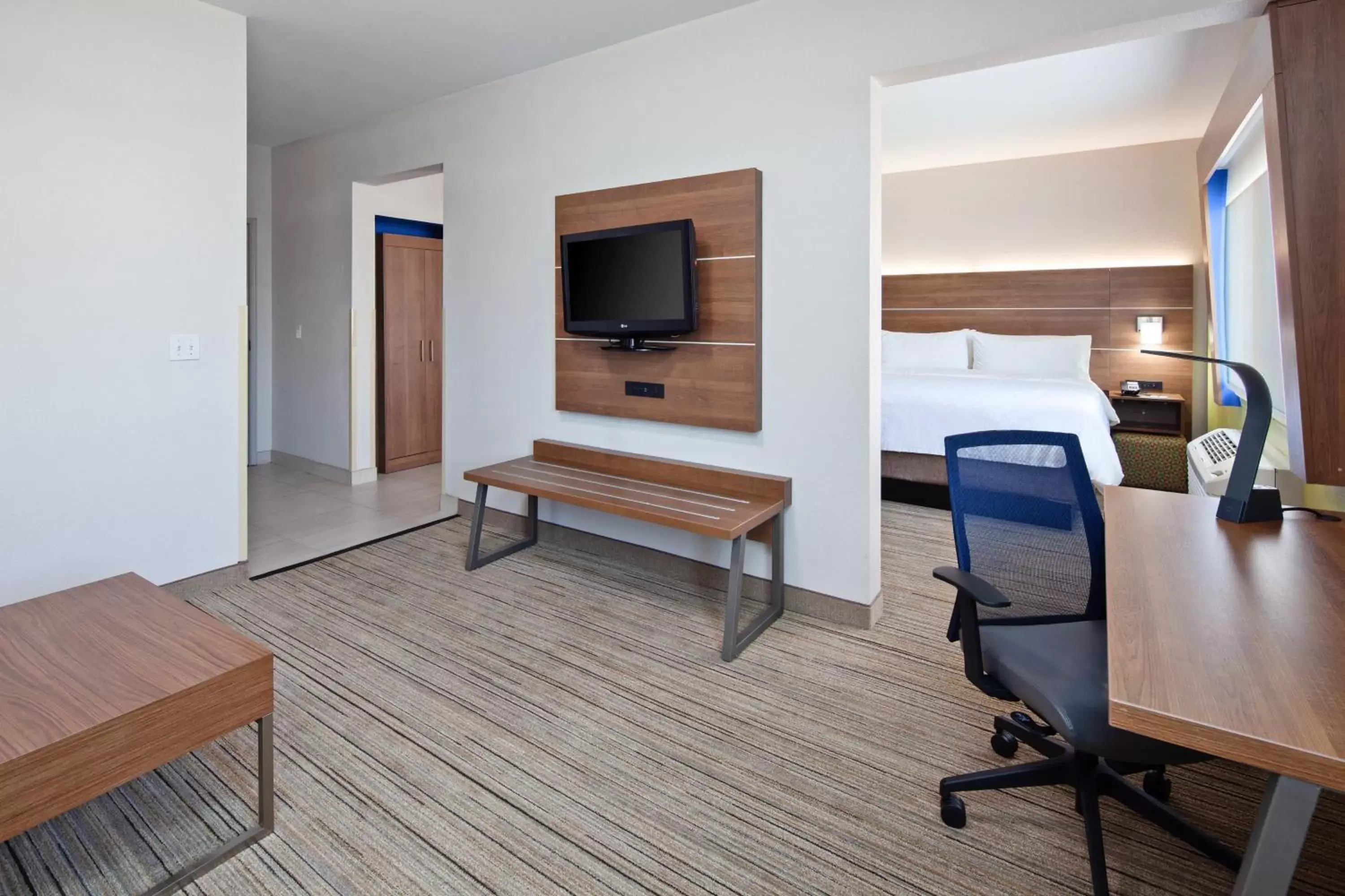 Photo of the whole room, TV/Entertainment Center in Holiday Inn Express & Suites - Tulare, an IHG Hotel