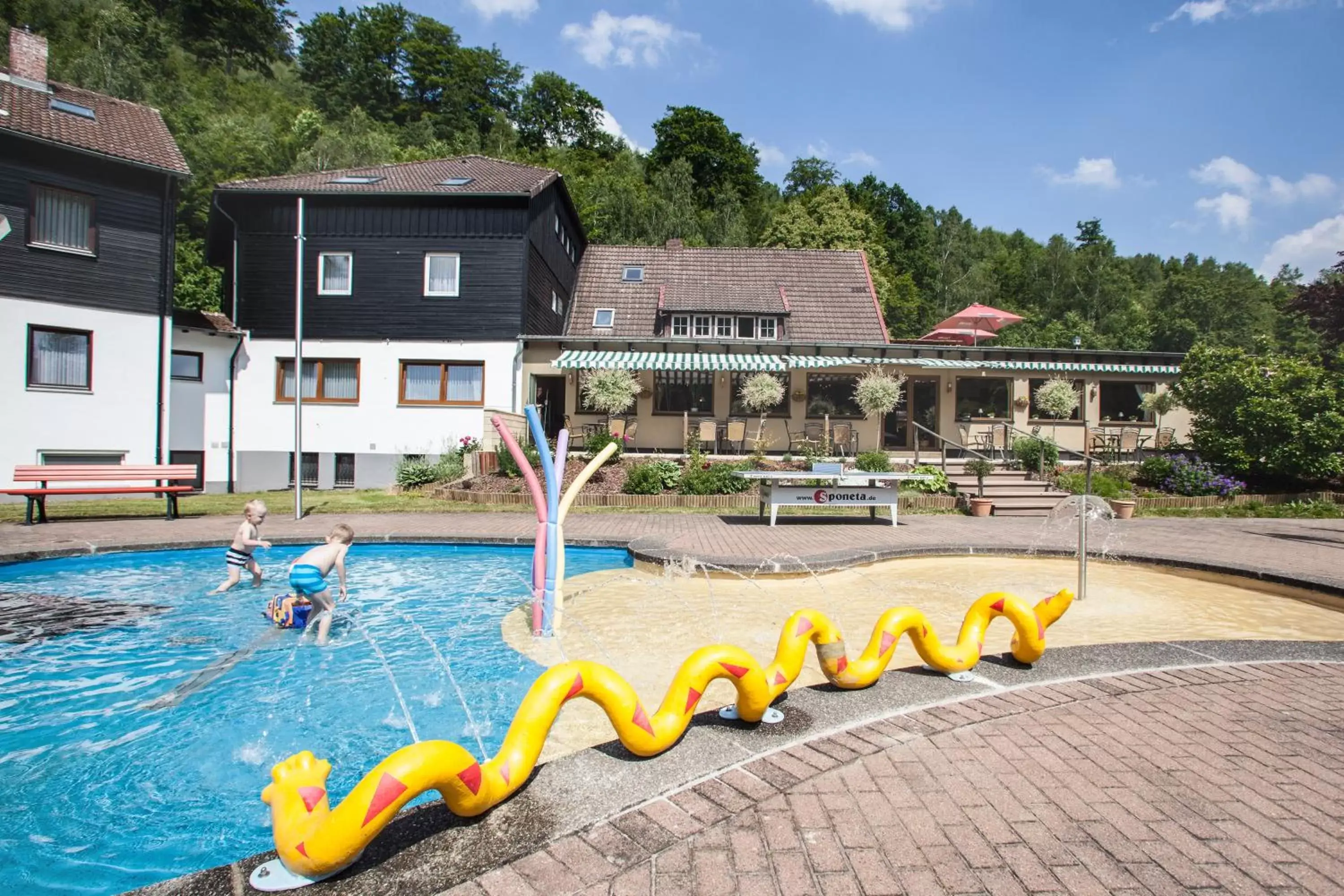 Property building, Swimming Pool in Hotel Im Tannengrund