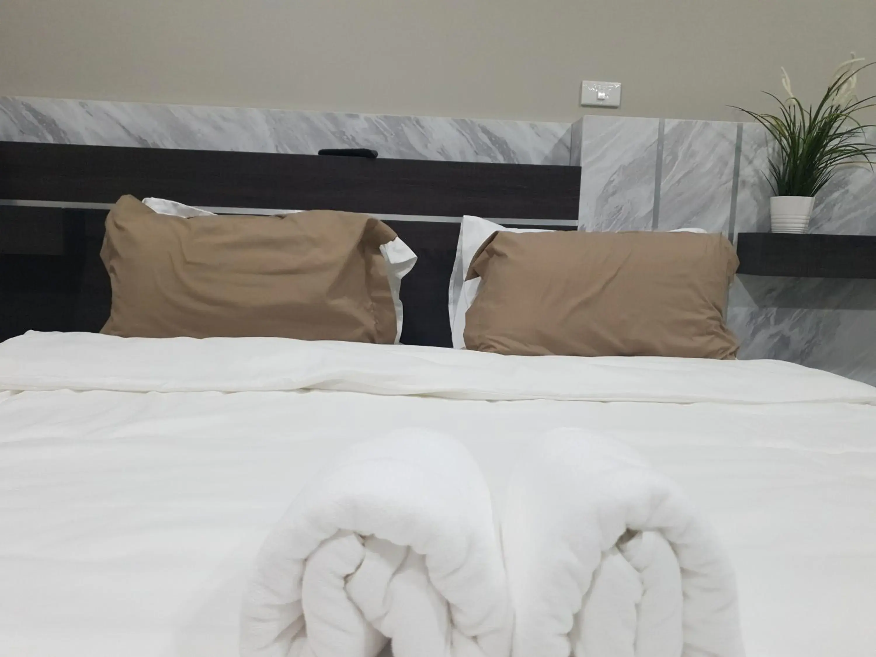 Bed in iResidence Hotel Pathumthani