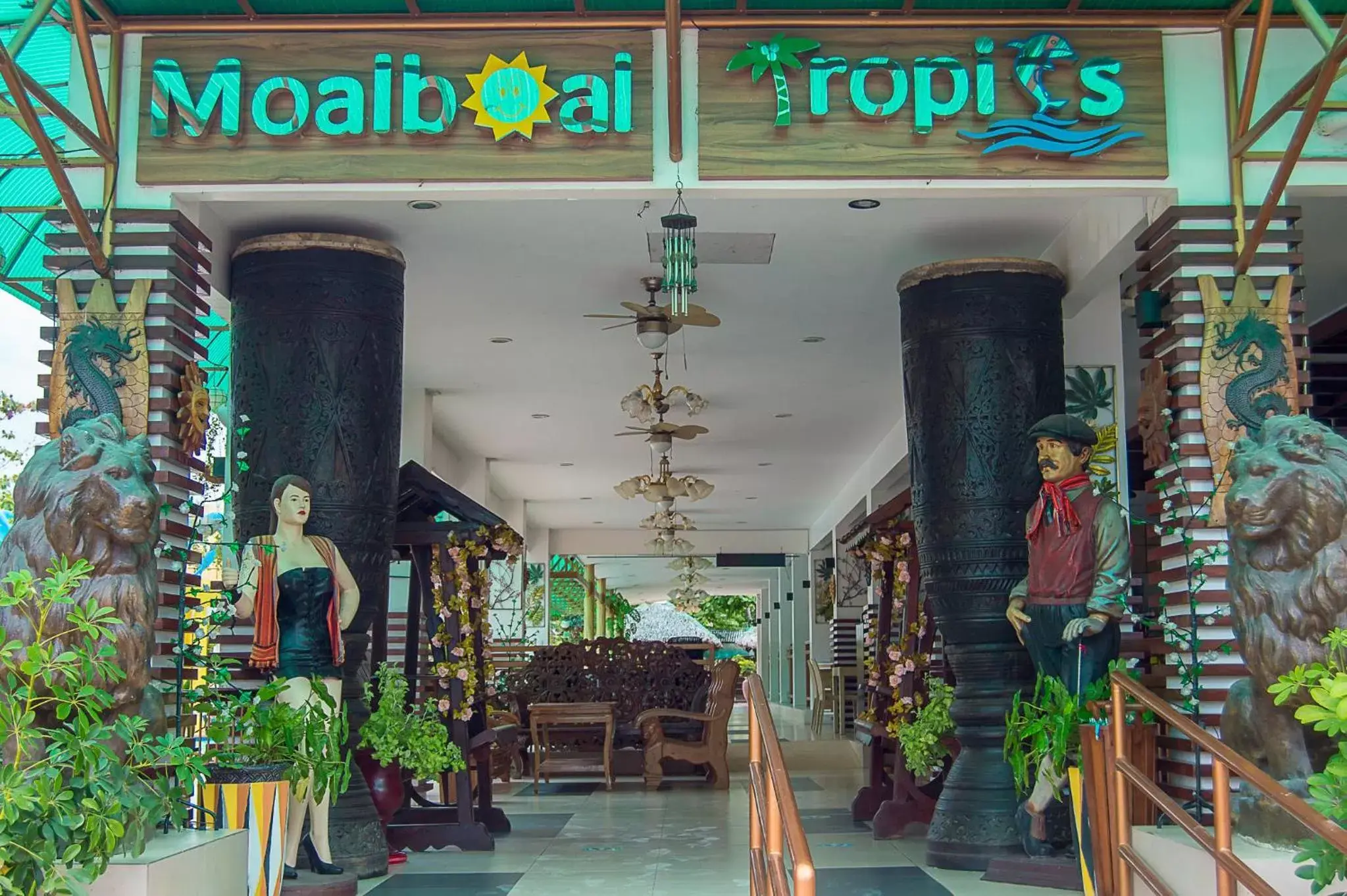 Property logo or sign in Moalboal Tropics Property logo or sign in Moalboal Tropics