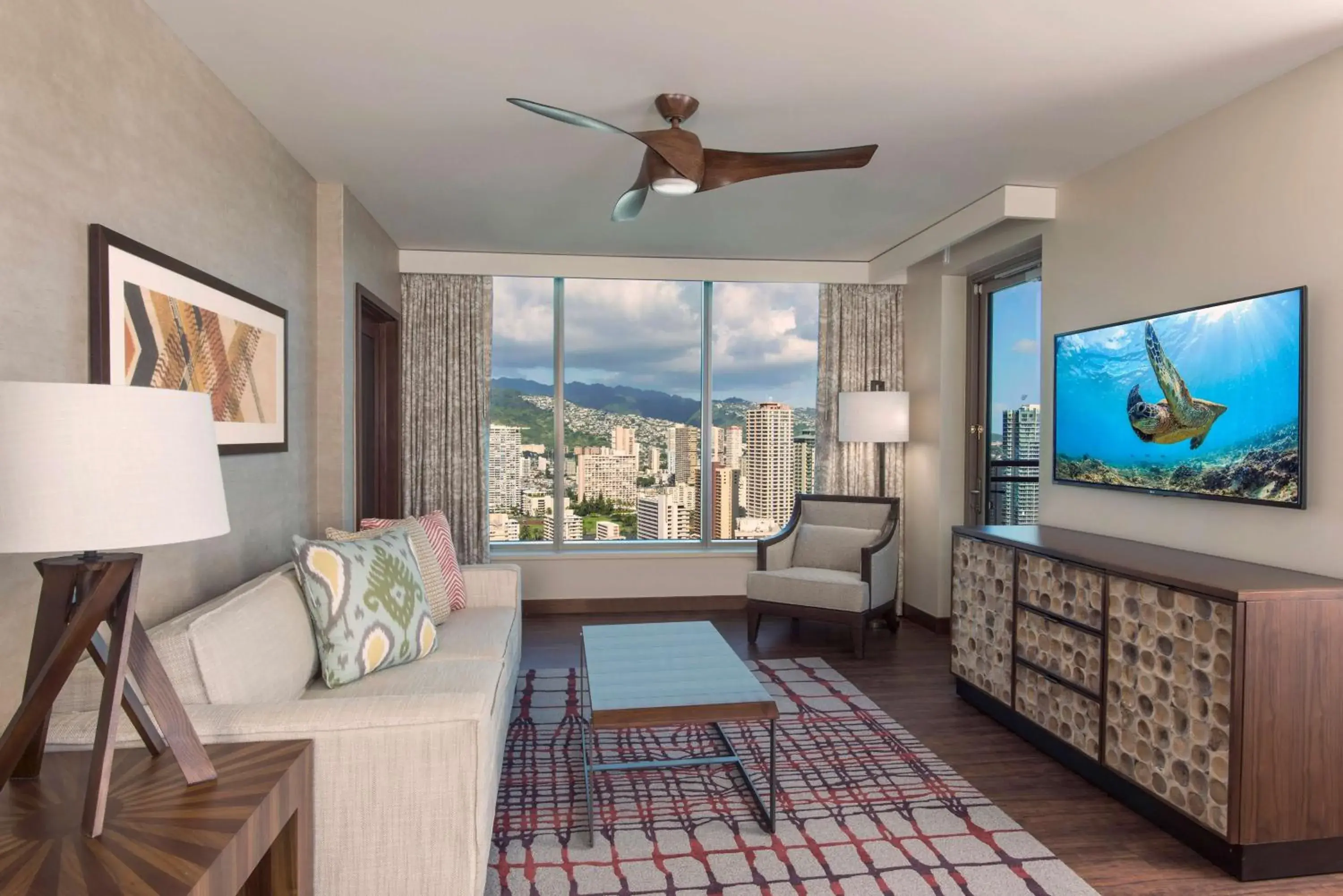Living room, Seating Area in Hilton Grand Vacation Club The Grand Islander Waikiki Honolulu