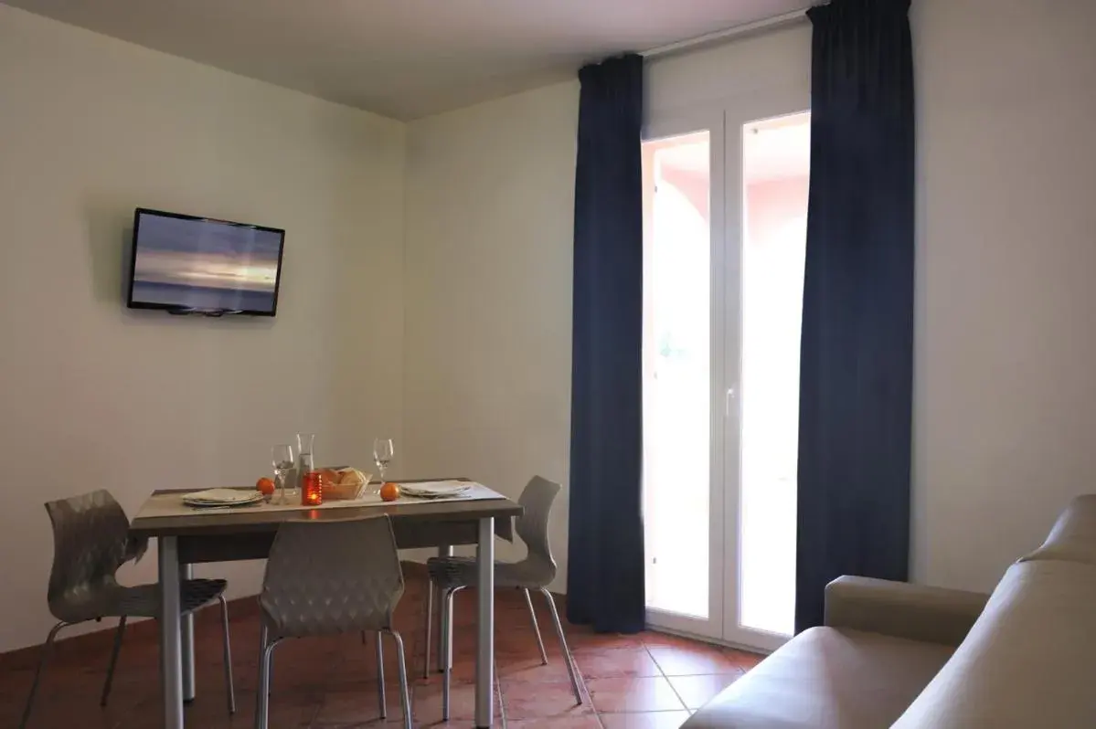 Living room, Dining Area in Ai Pozzi Village Hotel & Resort