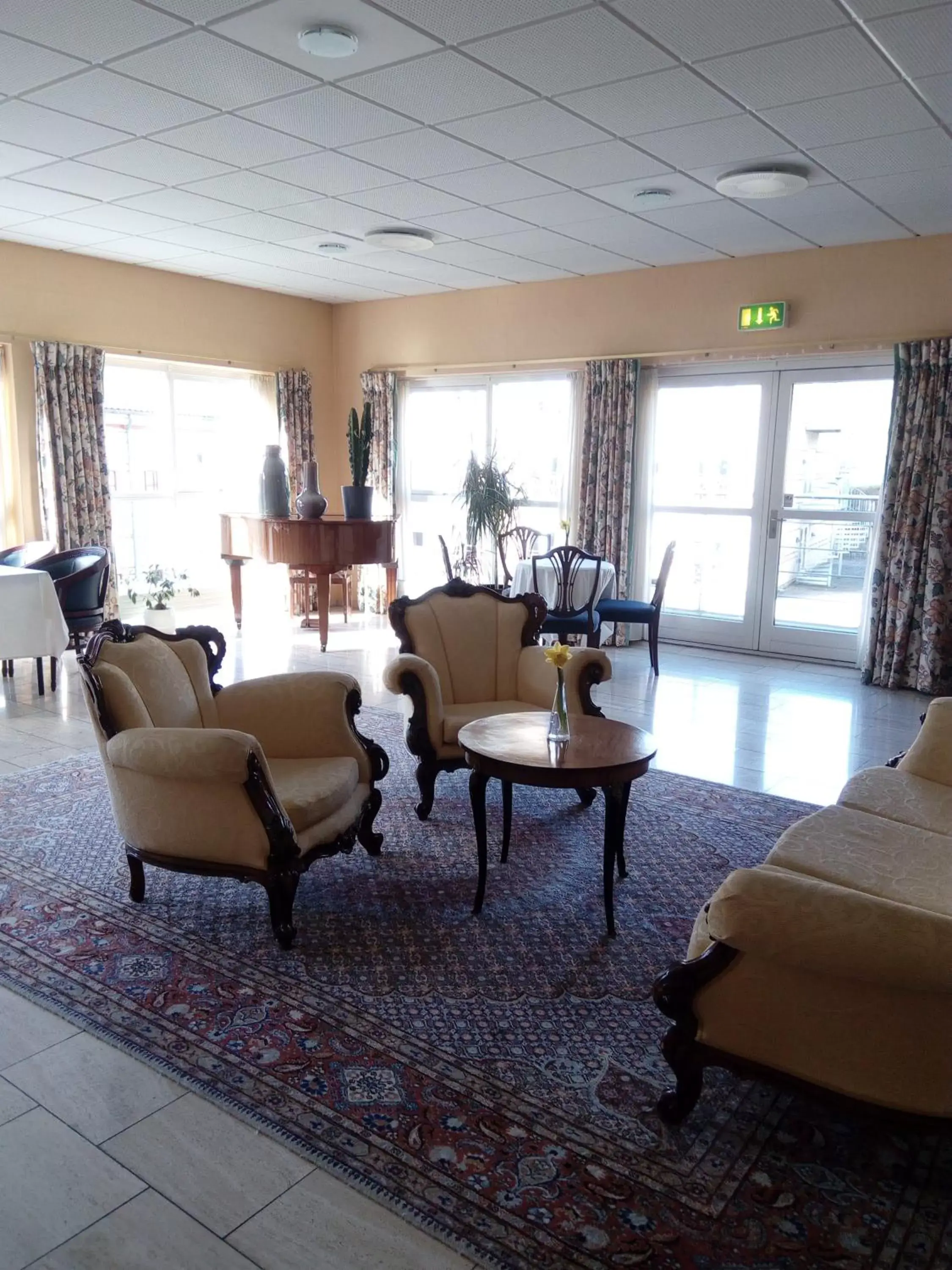 Communal lounge/ TV room, Seating Area in Montra Odder Parkhotel