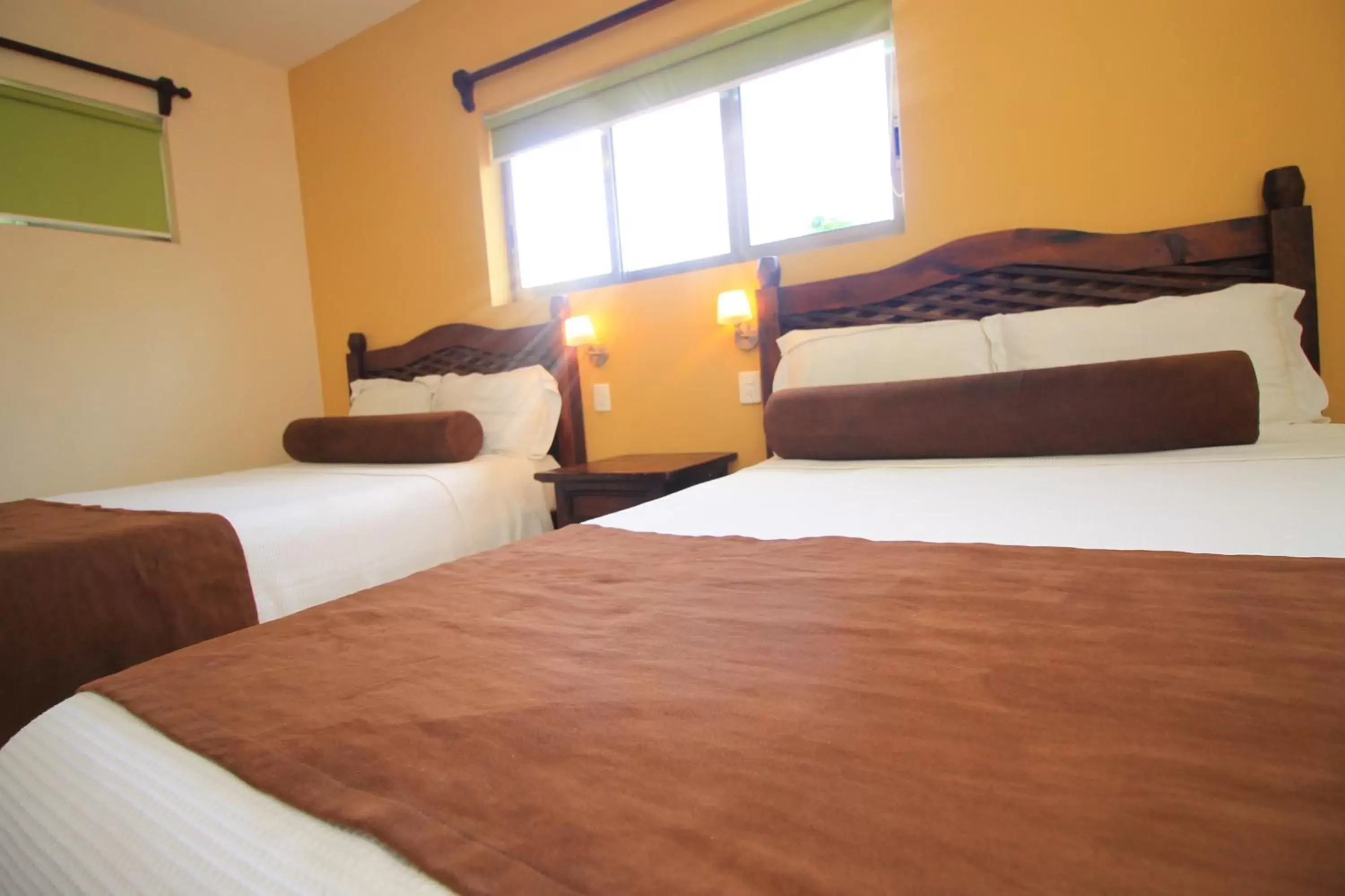 Bed in Papagayo Hotel Boutique