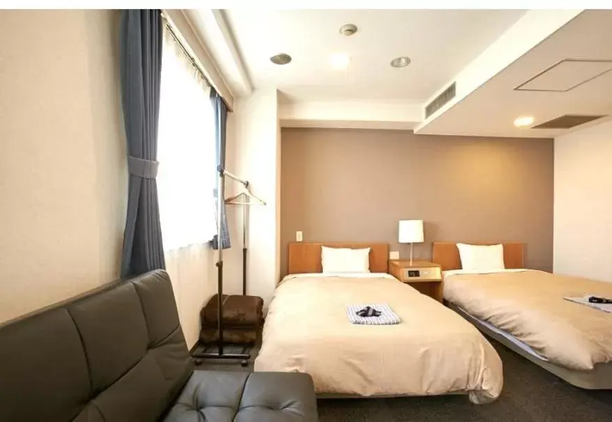 Bed in Hotel New Yutaka