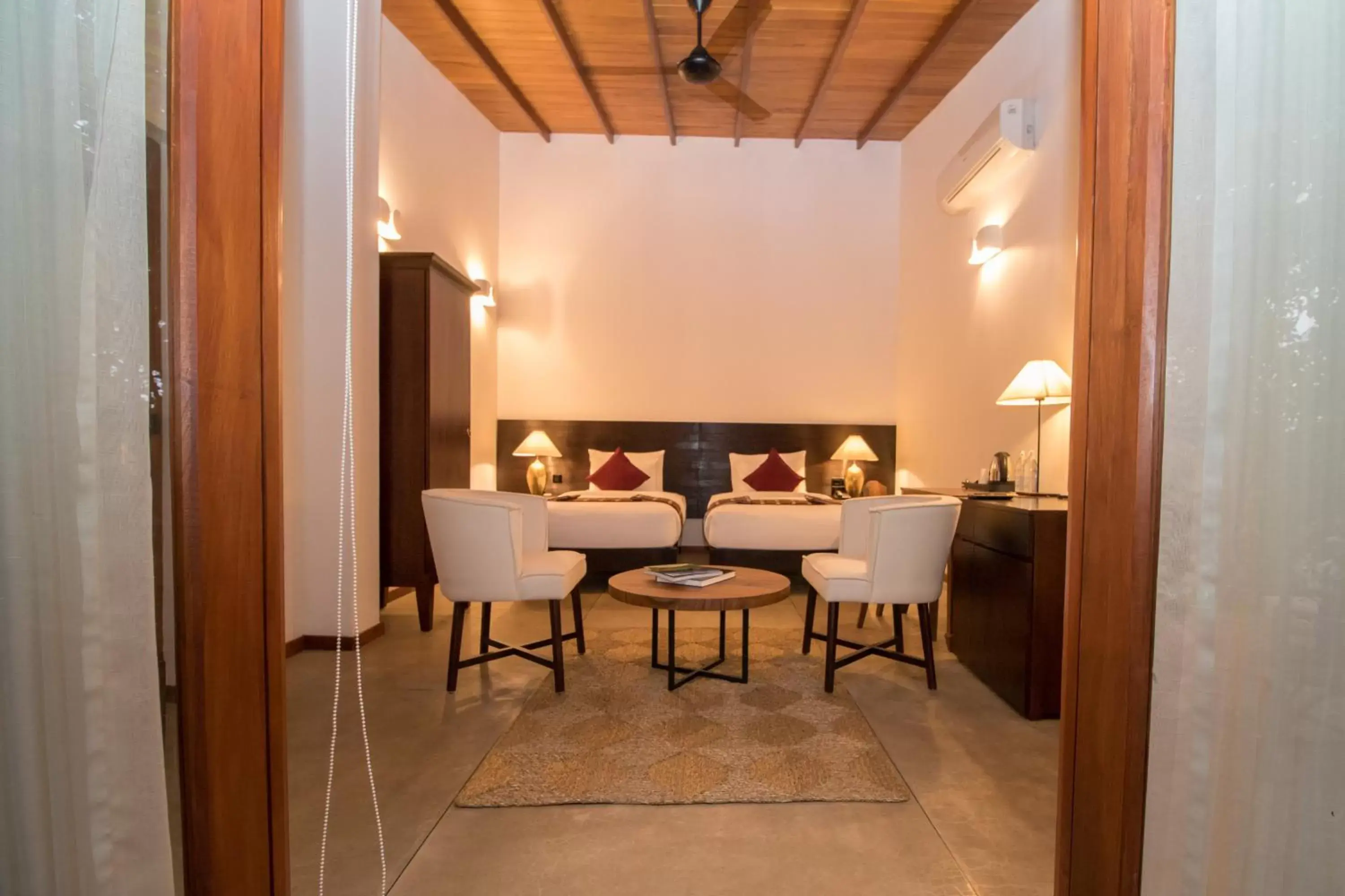 Bed, Dining Area in Kings Pavilion Luxury Hotel