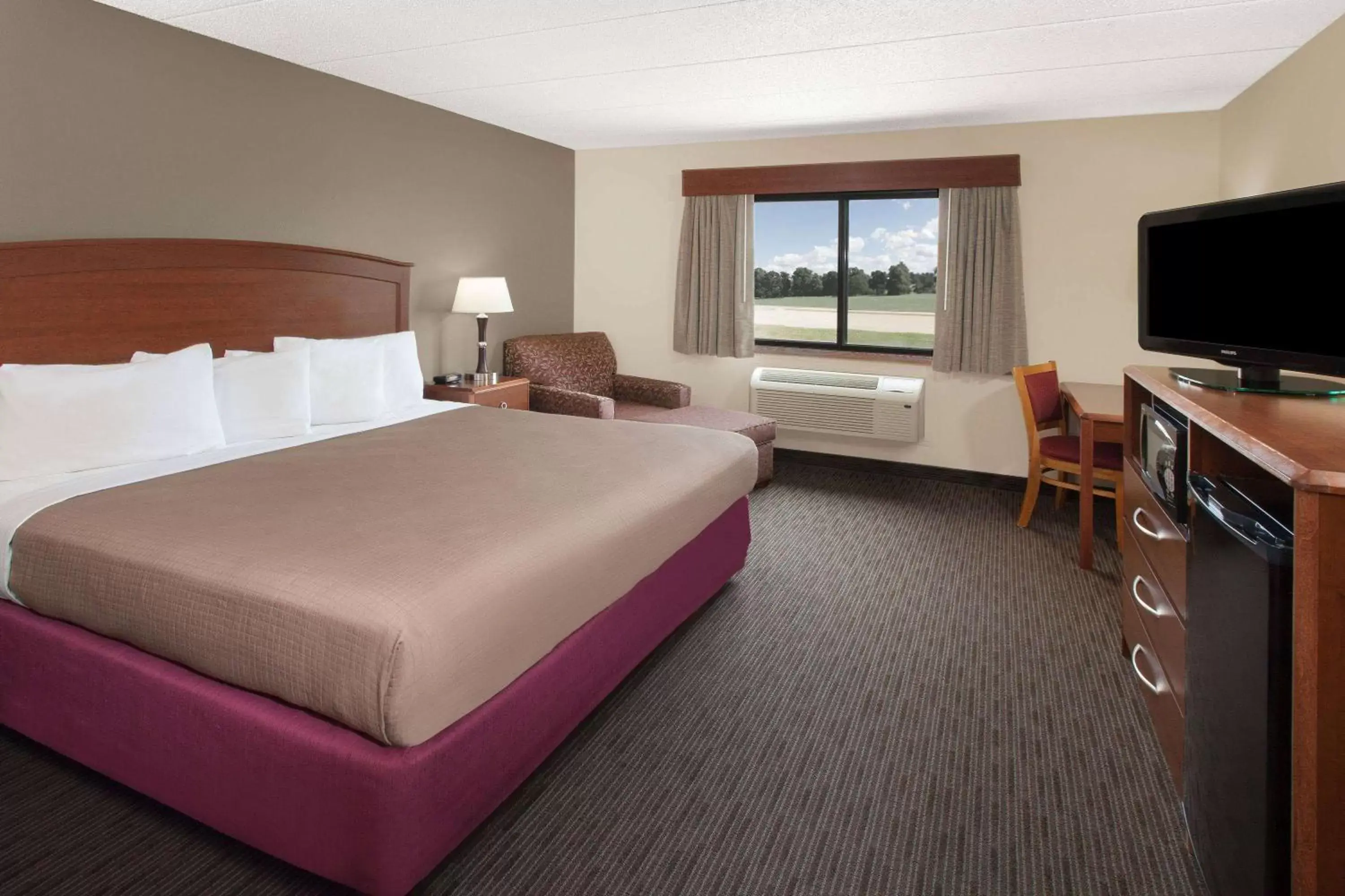 Photo of the whole room in AmericInn by Wyndham Grundy Center