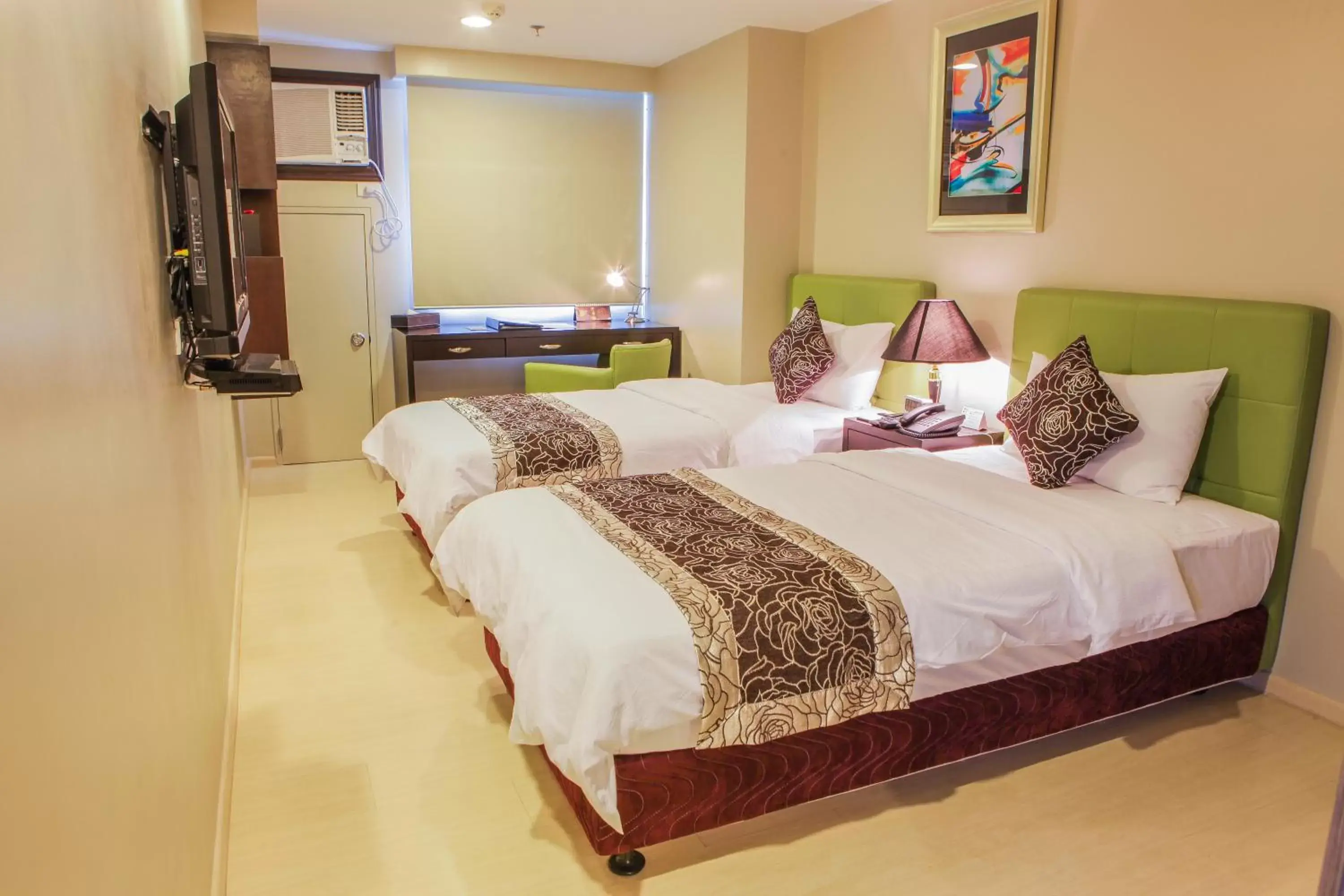 Bed in The Exchange Regency Residence Hotel Managed by HII