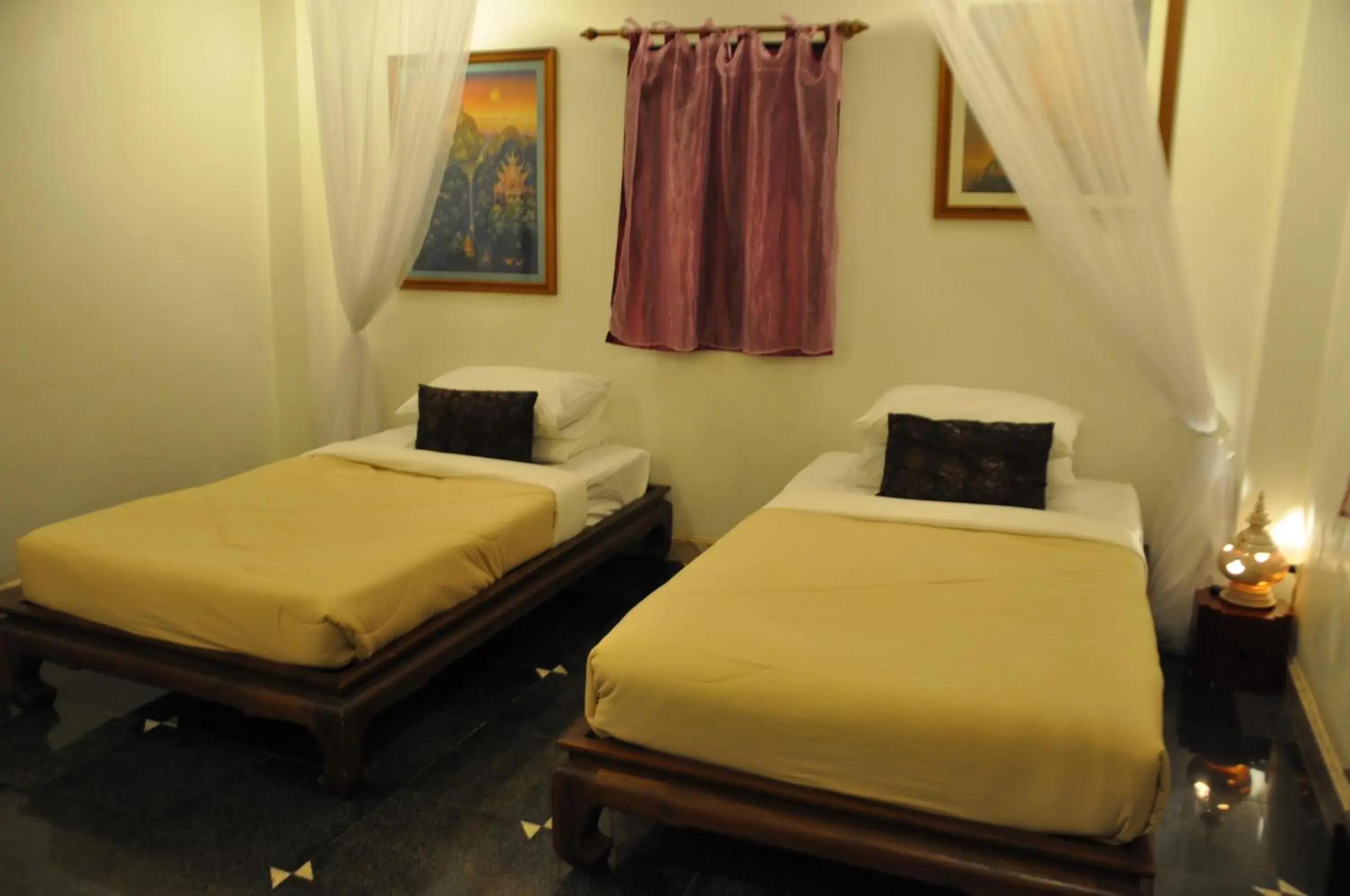 Bed in Ruean Thai Hotel