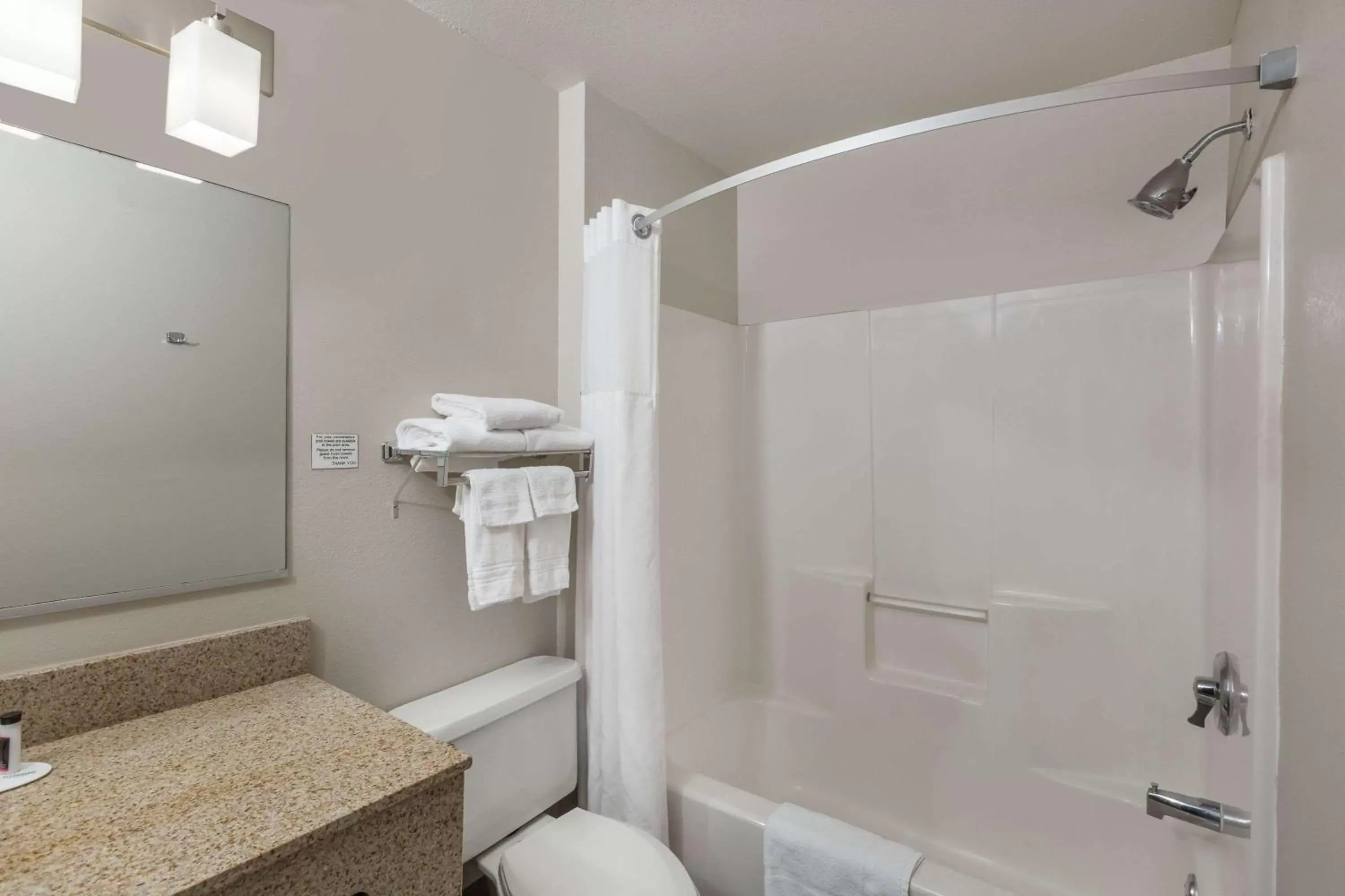 Bathroom in Ramada by Wyndham Platte City KCI Airport