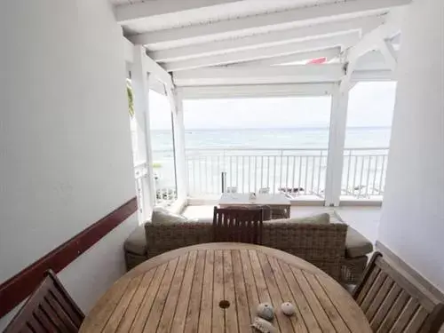 Dining area, Balcony/Terrace in Coco Beach Marie-Galante