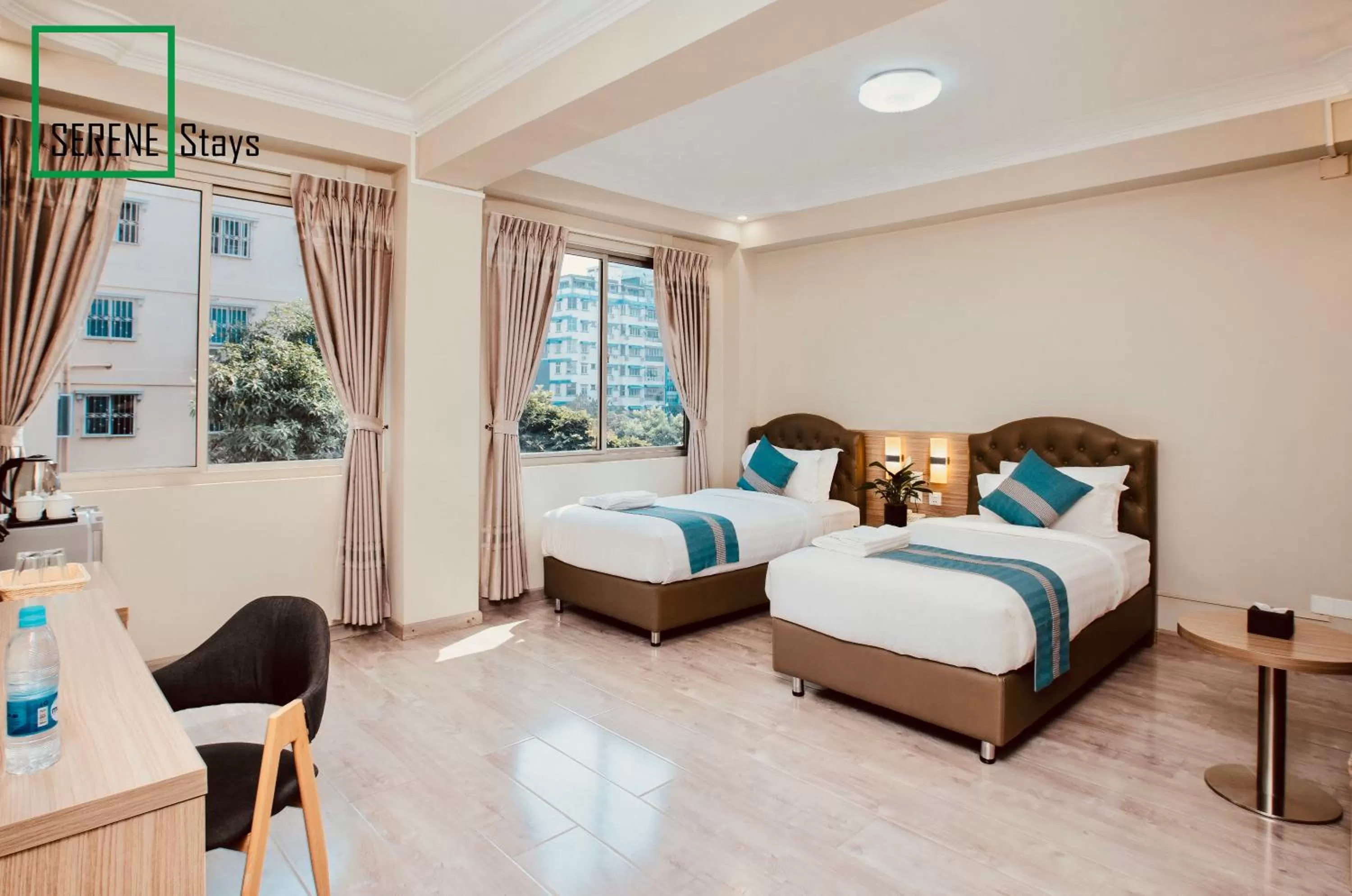 Photo of the whole room, Bed in SERENE Stays Hotel